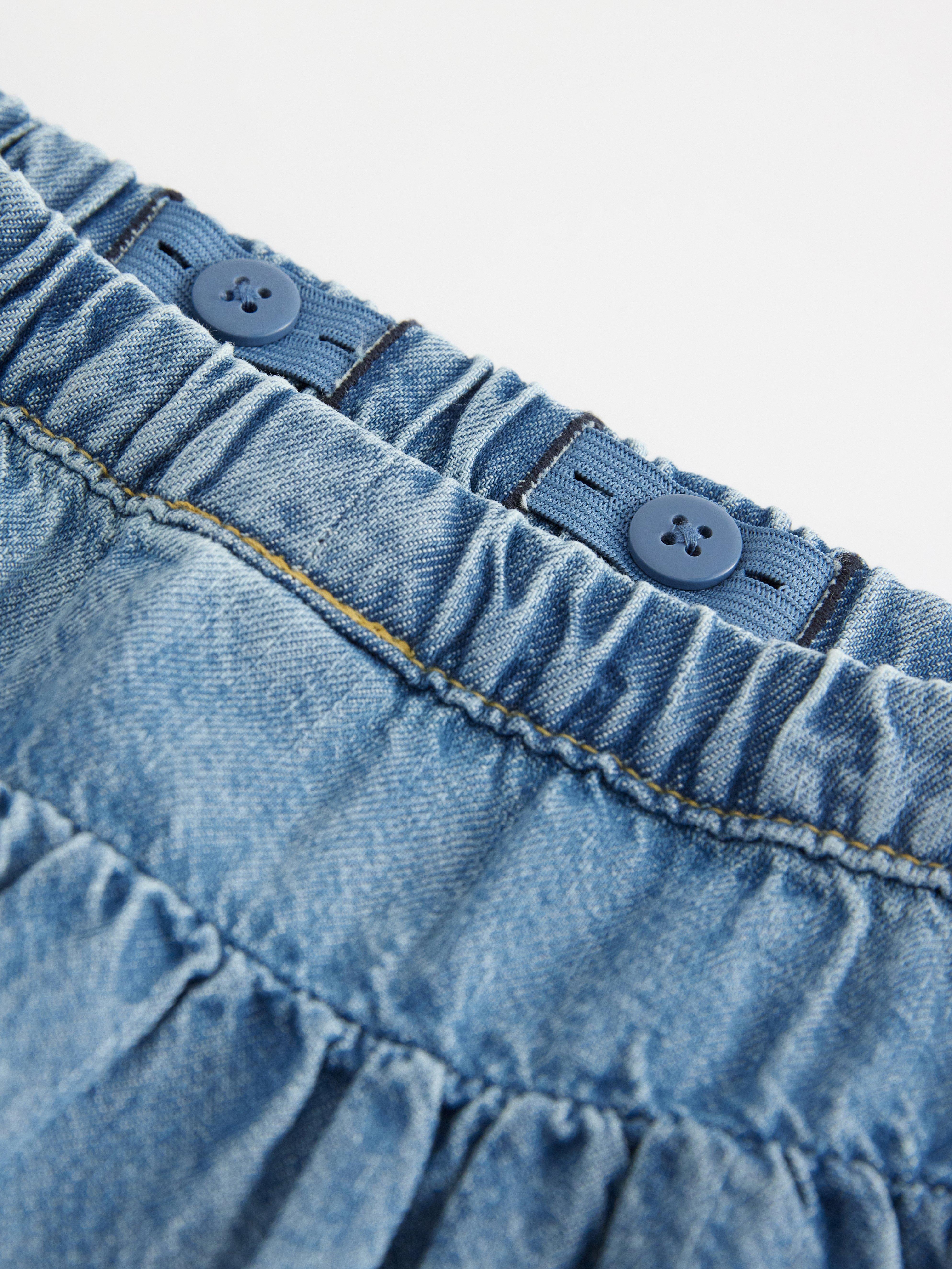 Saia com aparência de jeans