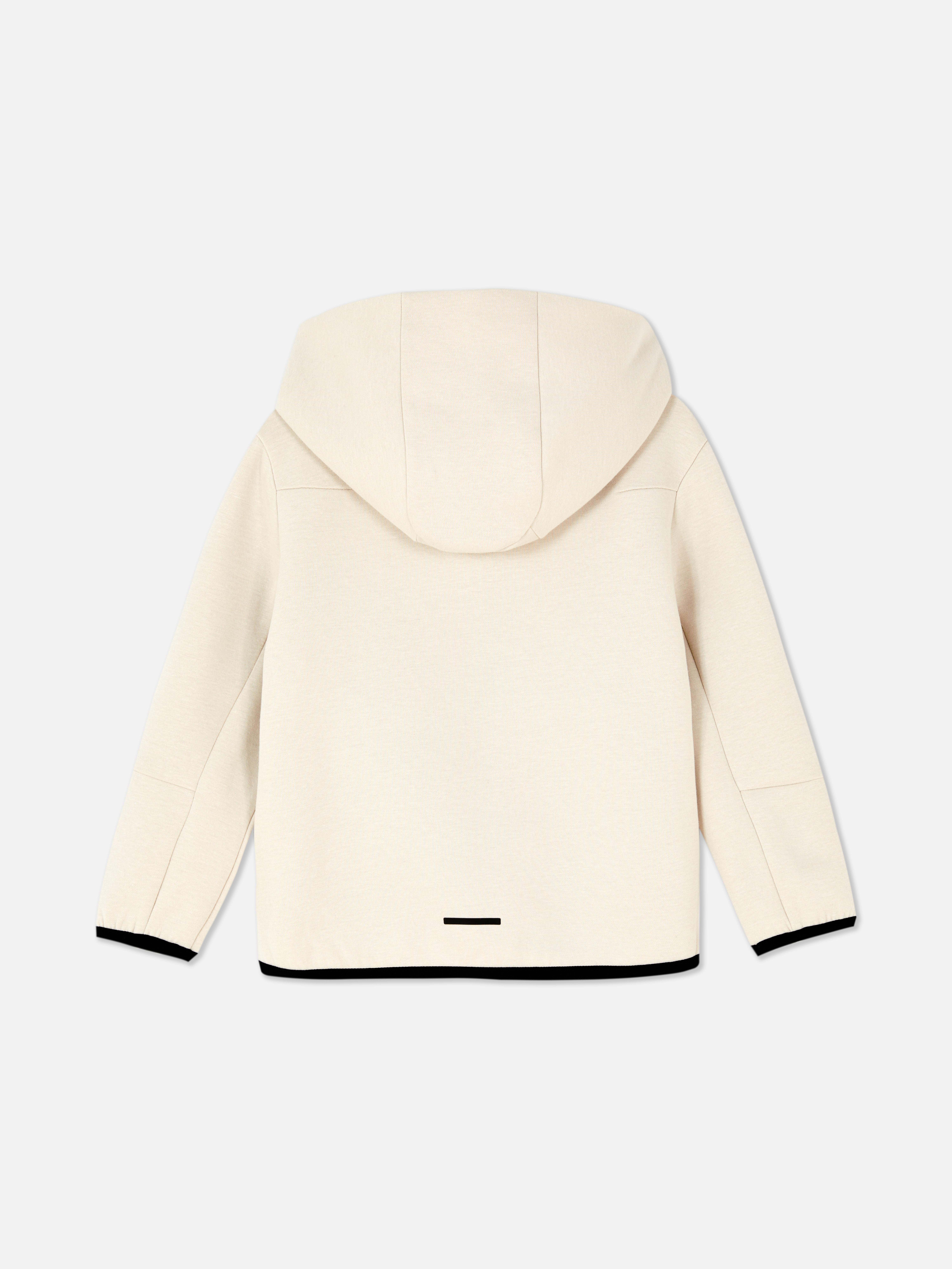 Passender Kapuzenpullover aus Verbundstoff mit Reißverschluss. Dieser Kapuzenpullover verfügt über einen Reißverschluss und Taschen.