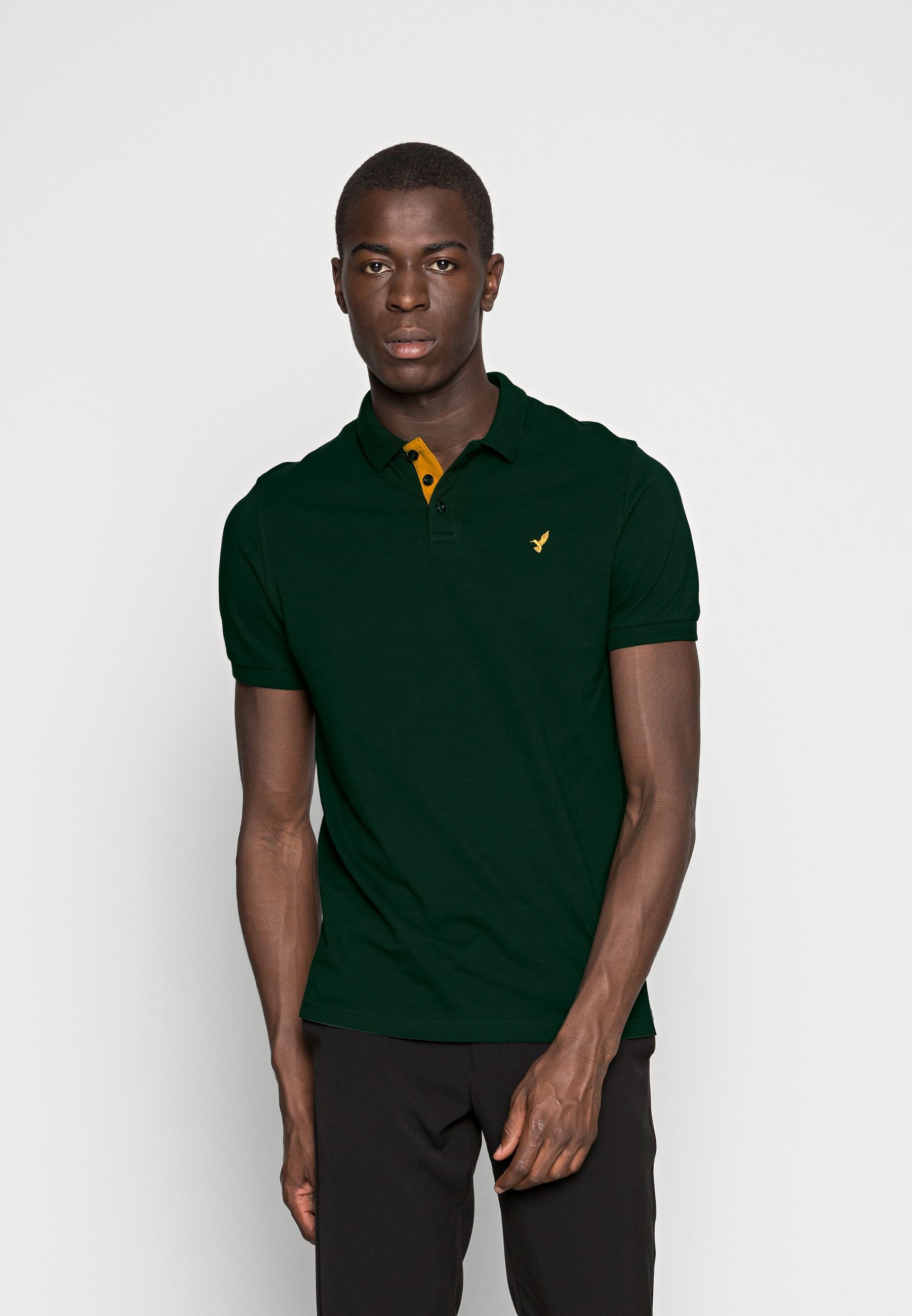 Pier One SLIM - Poloshirt - donkergroen