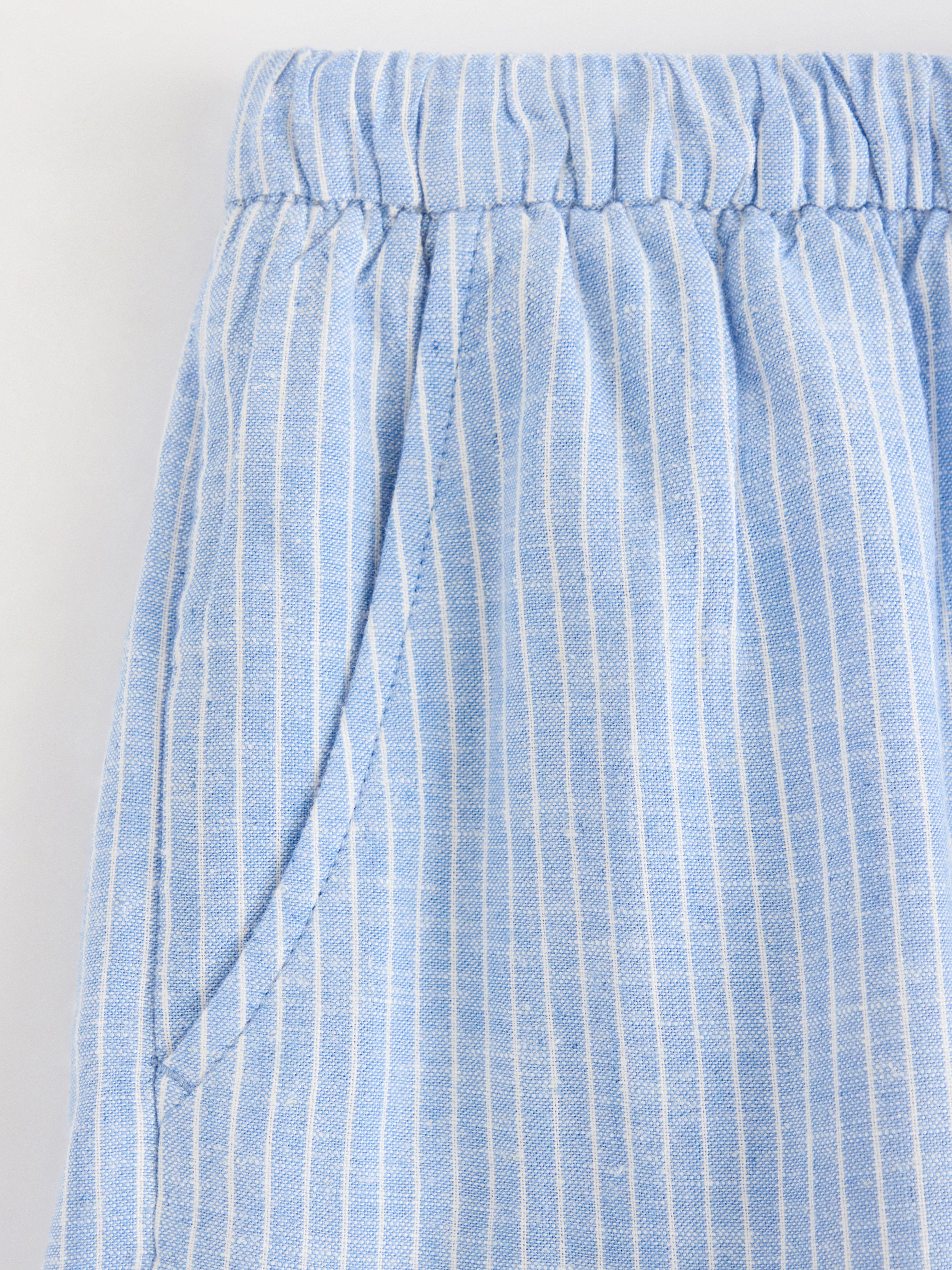 Pantalones cortos de lino azul claro empolvado