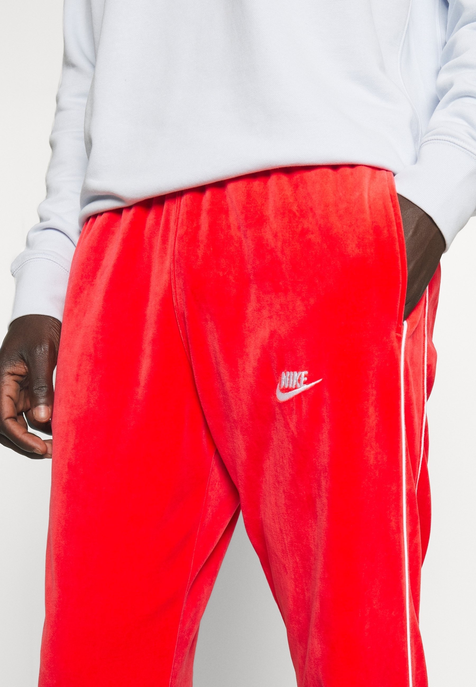 Nike Sportswear trainingsbroek - rood