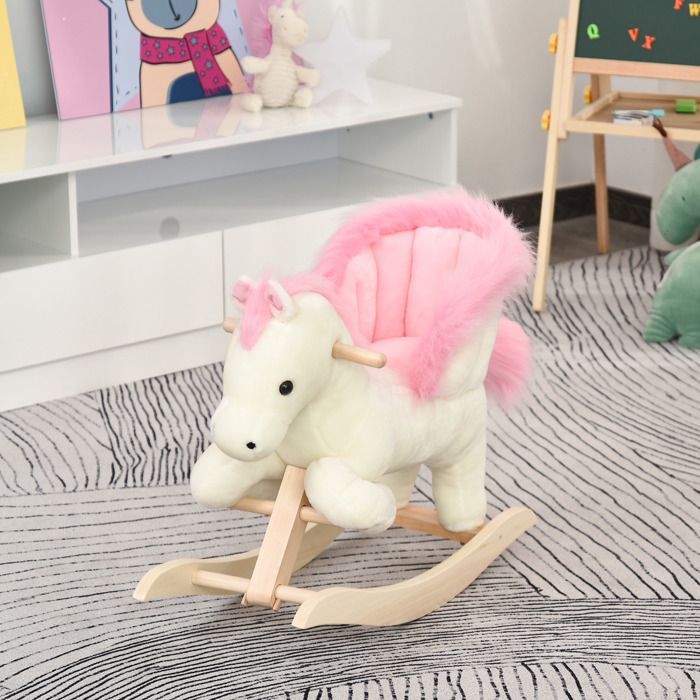 Caballo balancín - HOMCOM - Función musical, silla de montar suave y cómoda de felpa para niños de 18 a 36 meses - Madera - 70x28x57cm - Rosa