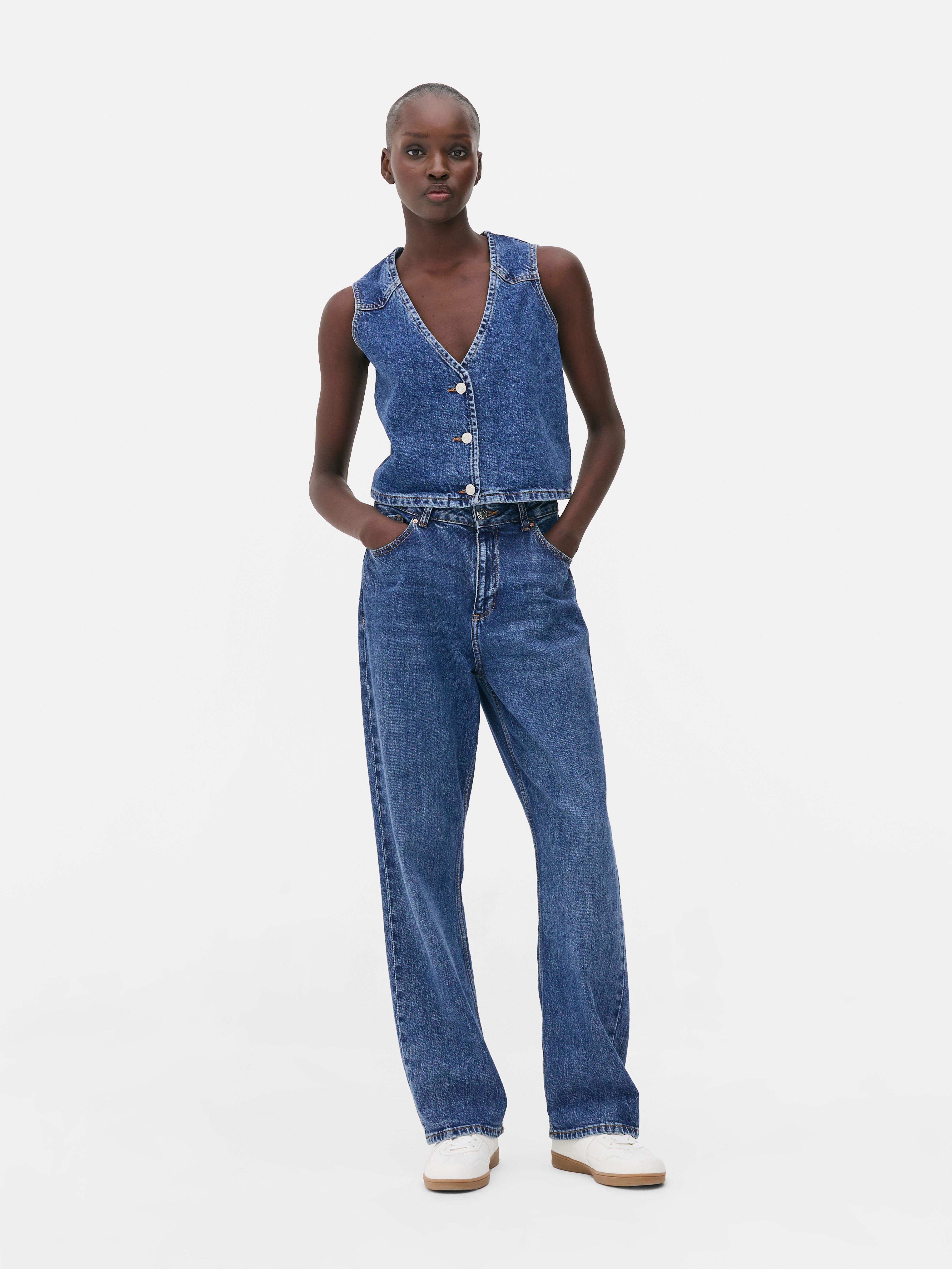 Vestă din denim cu nasturi Vestă din denim cu decolteu în V și închidere cu nasturi în față