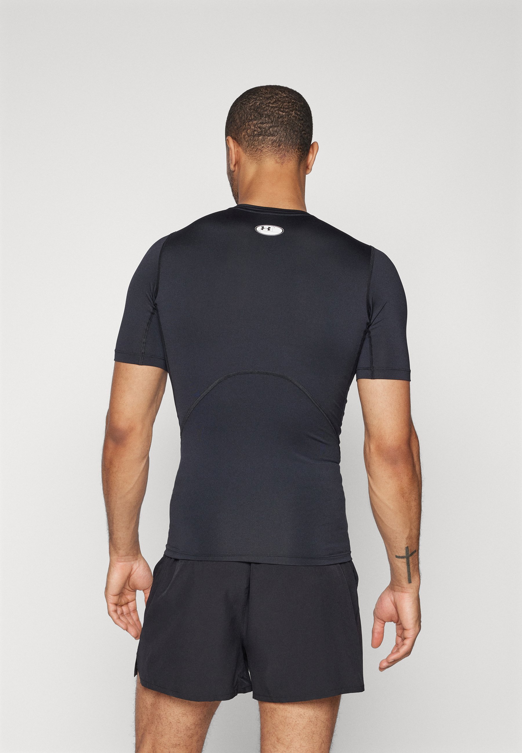Under Armour HEATGEAR - T-shirt sportiva - nero/bianco