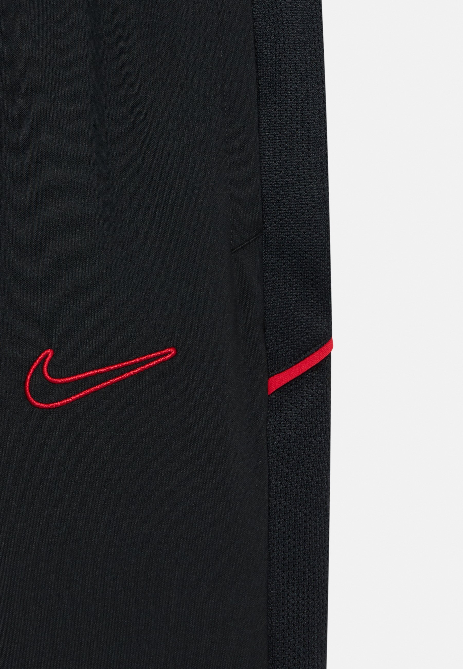 Nike Performance PANT UNISEX - Verryttelyhousut - black/university red