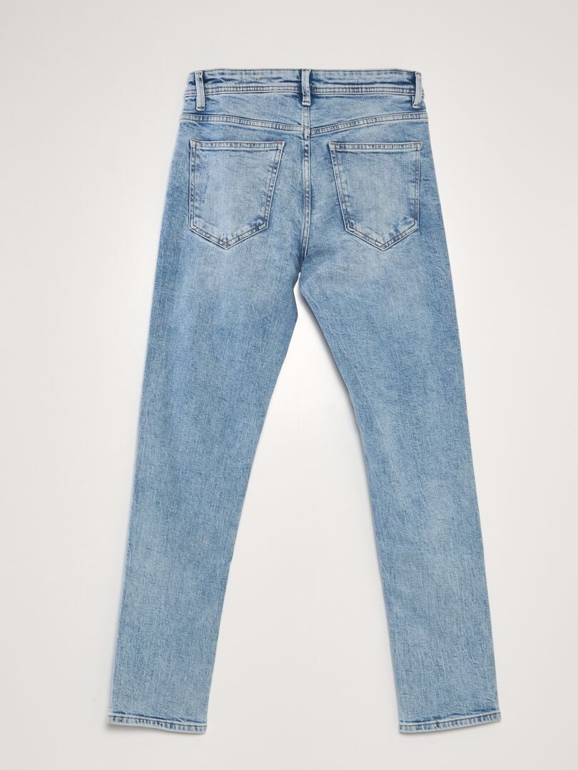 Jeansy Slim z przetarciami - L32 - NIEBIESKIE