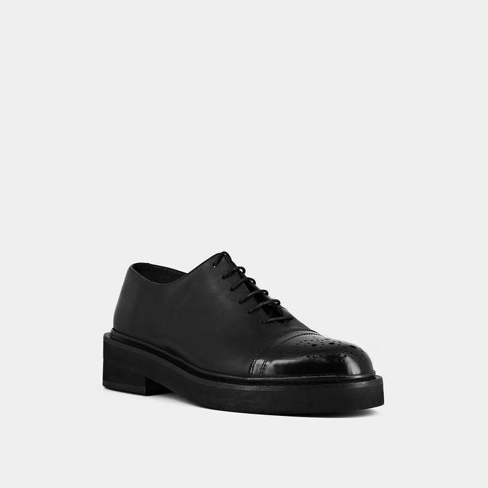 Mocassins à lacets et surpiqures  en cuir noir