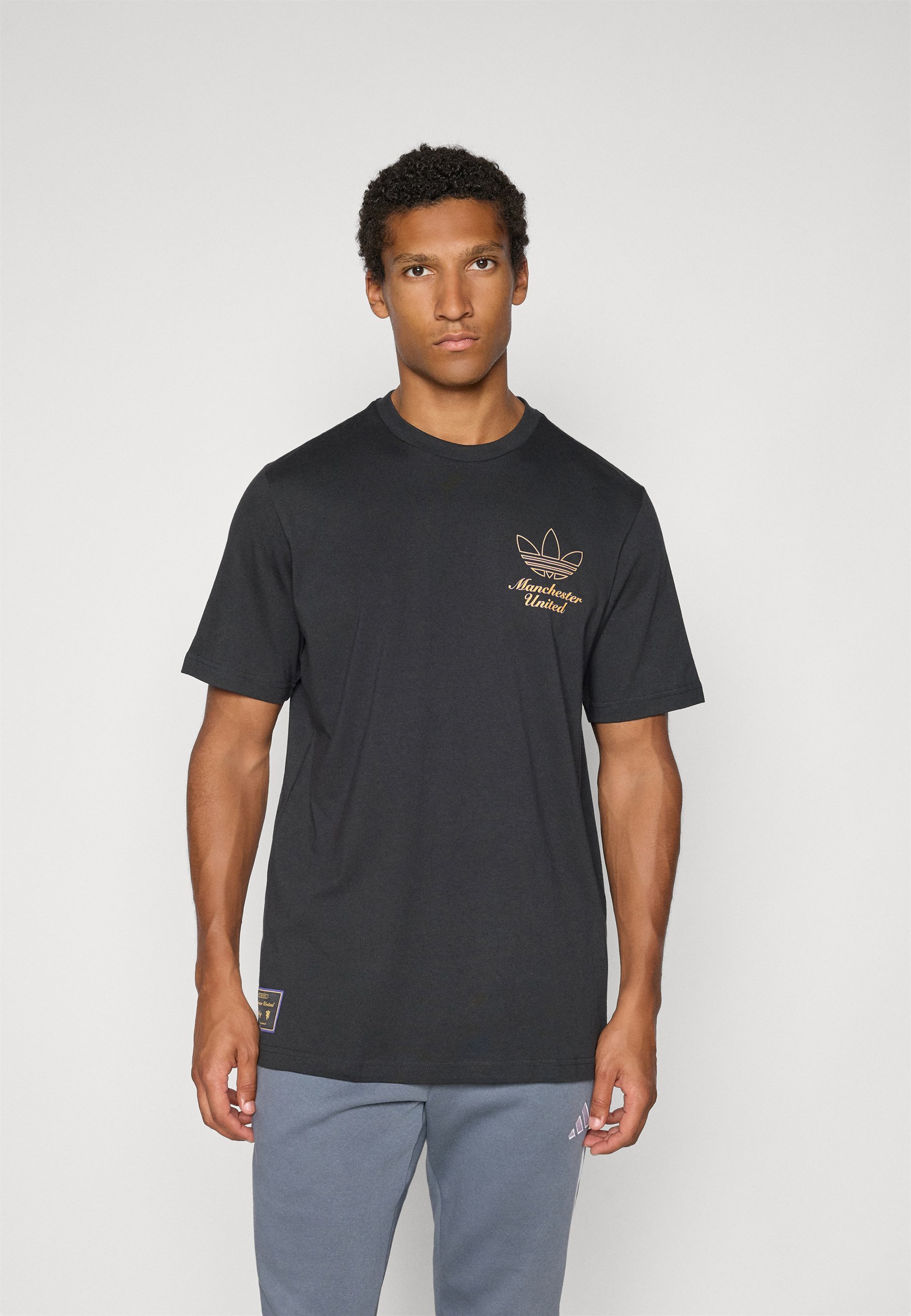 adidas Originals MANCHESTER UNITED ICON GRAPHIC T-SHIRT - Klubbklær - black