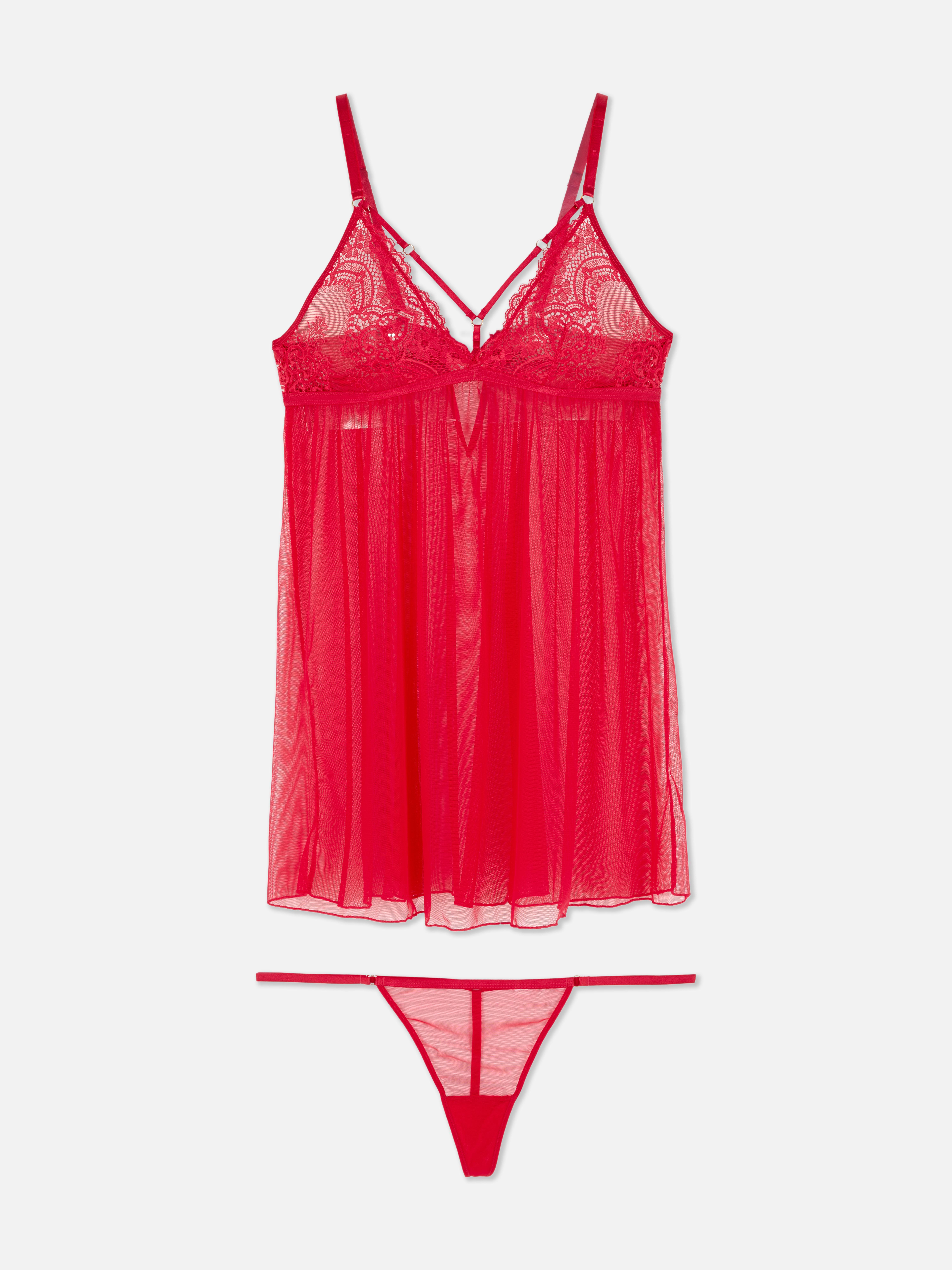 Completo composto da babydoll e perizoma senza ferretto. Babydoll e perizoma senza ferretto realizzati in rete trasparente e pizzo.