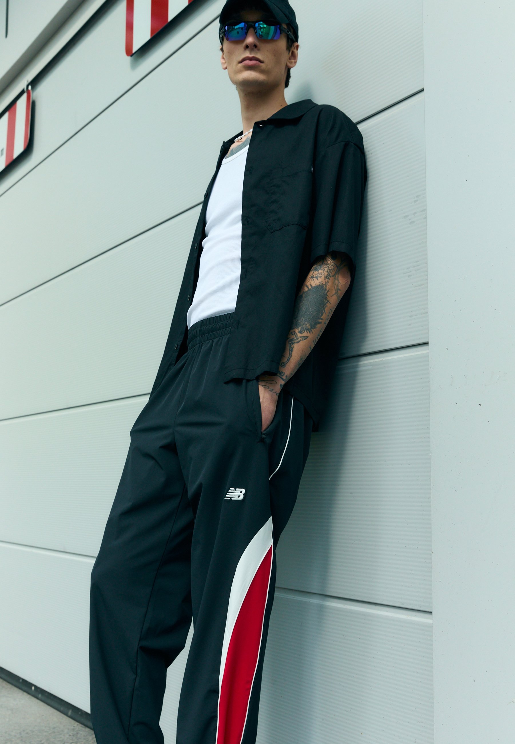 IN GAME TRACK PANT - Verryttelyhousut - blackNew Balance