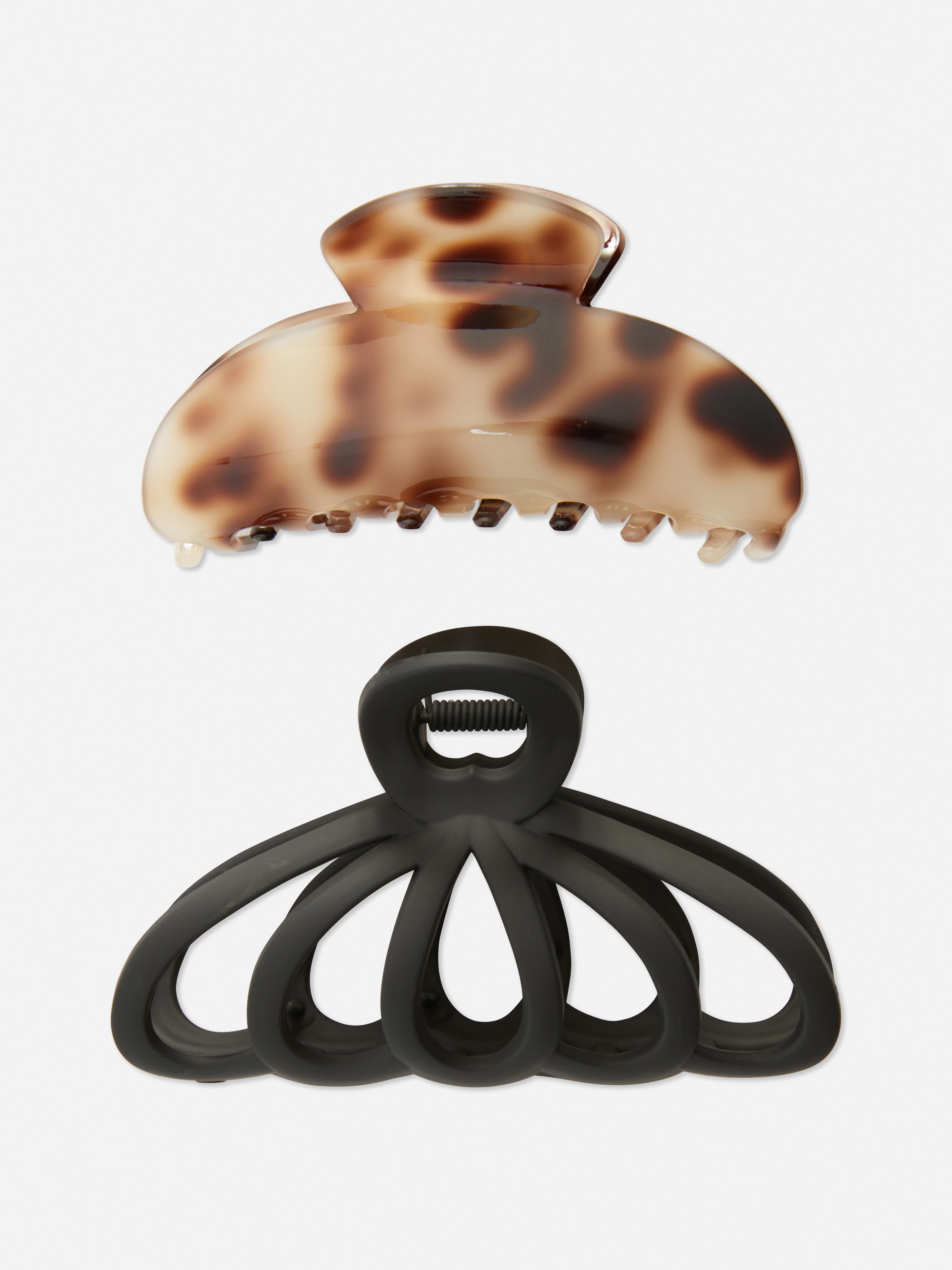 Verschiedene Haarspangen, 2er-Set. Zwei Haarspangen mit unterschiedlichen Designs für eine einfache Hochsteckfrisur.