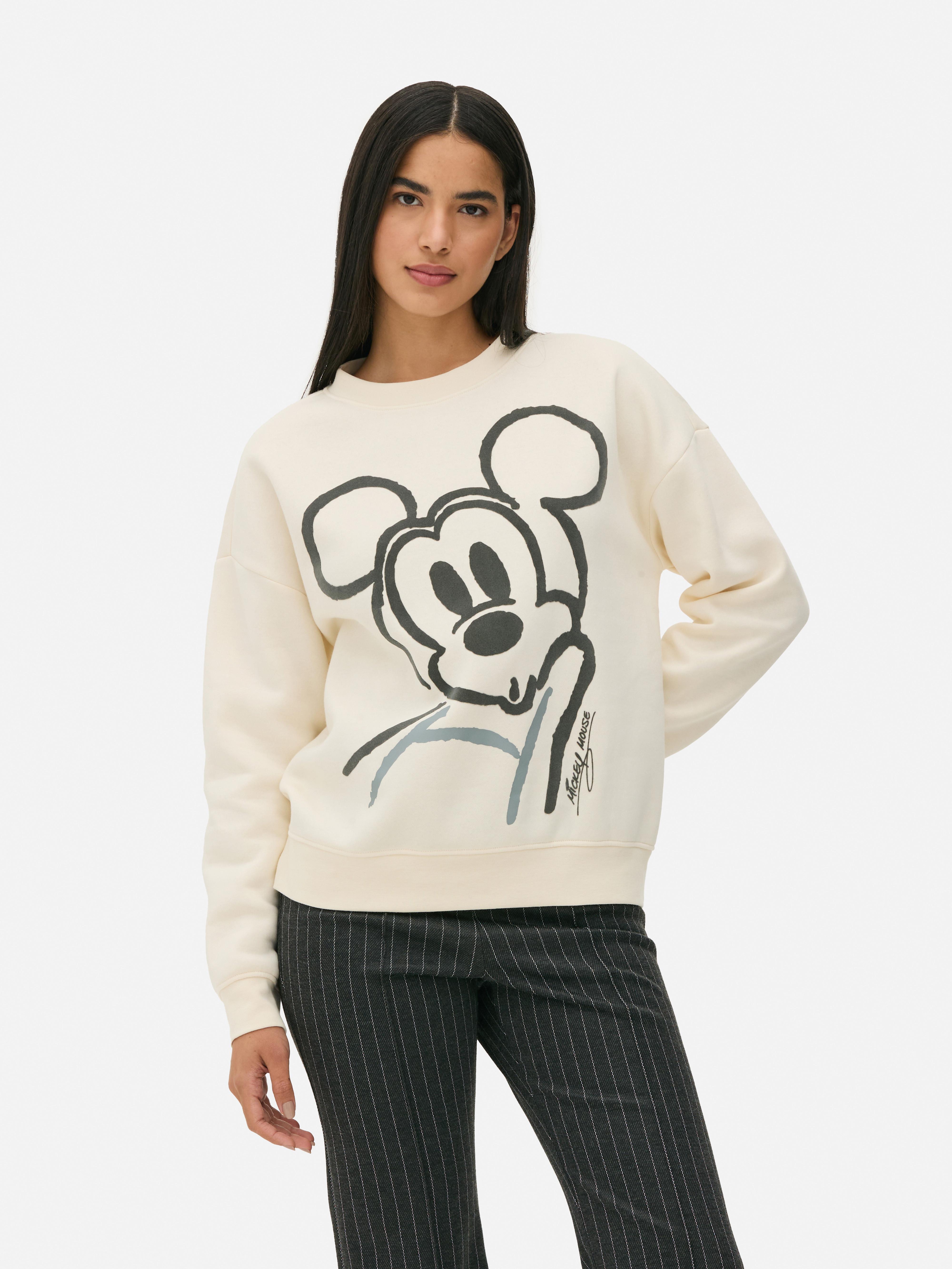 Hanorac cu imprimeu Mickey Mouse de la Disney. Un hanorac cu umeri căzuți, manșete cu nervuri și un design Mickey Mouse de la Disney.