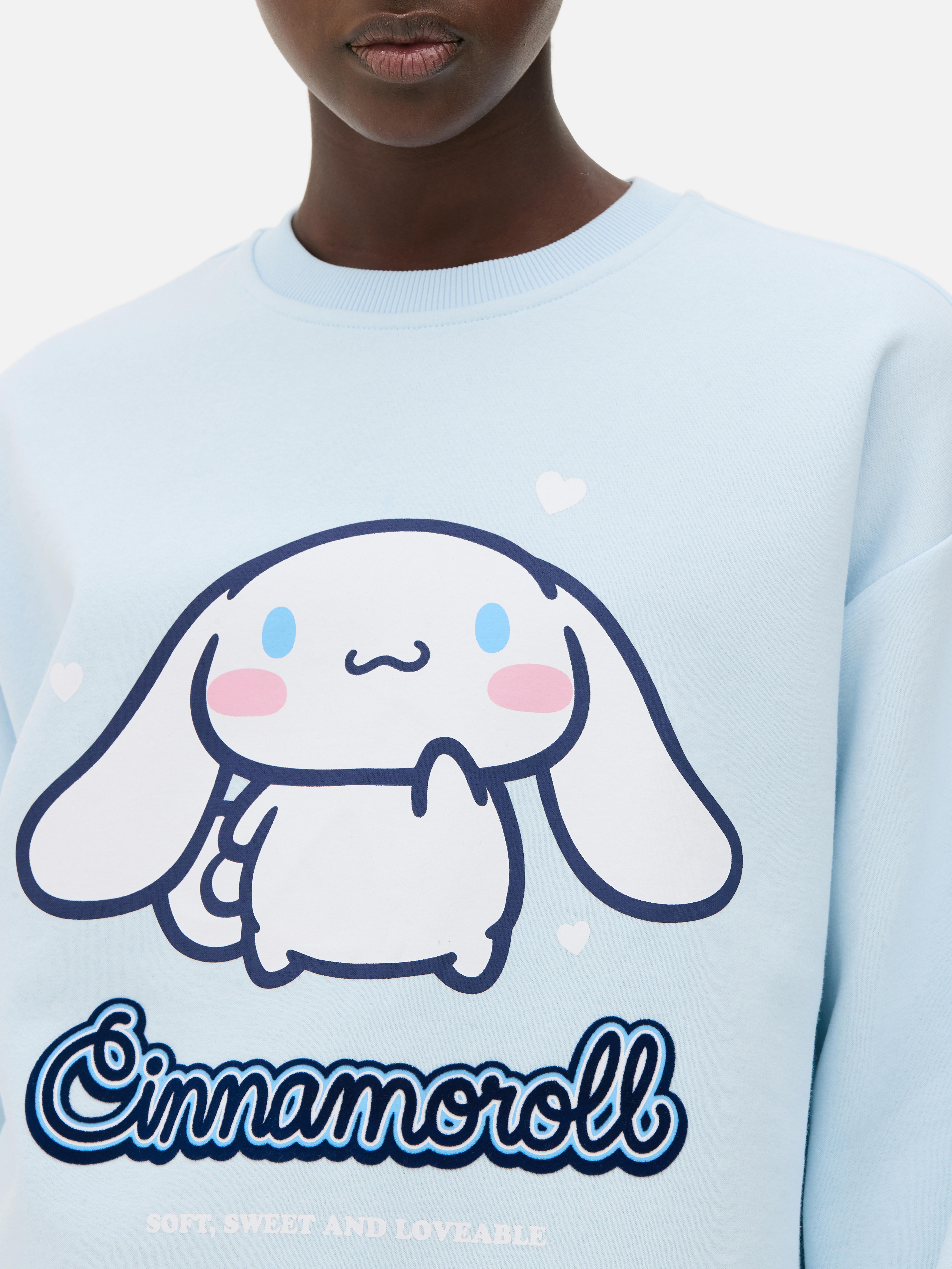 Φούτερ Hello Kitty με στάμπα Cinnamoroll. Φούτερ Sanrio με στρογγυλή λαιμόκοψη, μακριές μανσέτες και ριμπ τελείωμα.