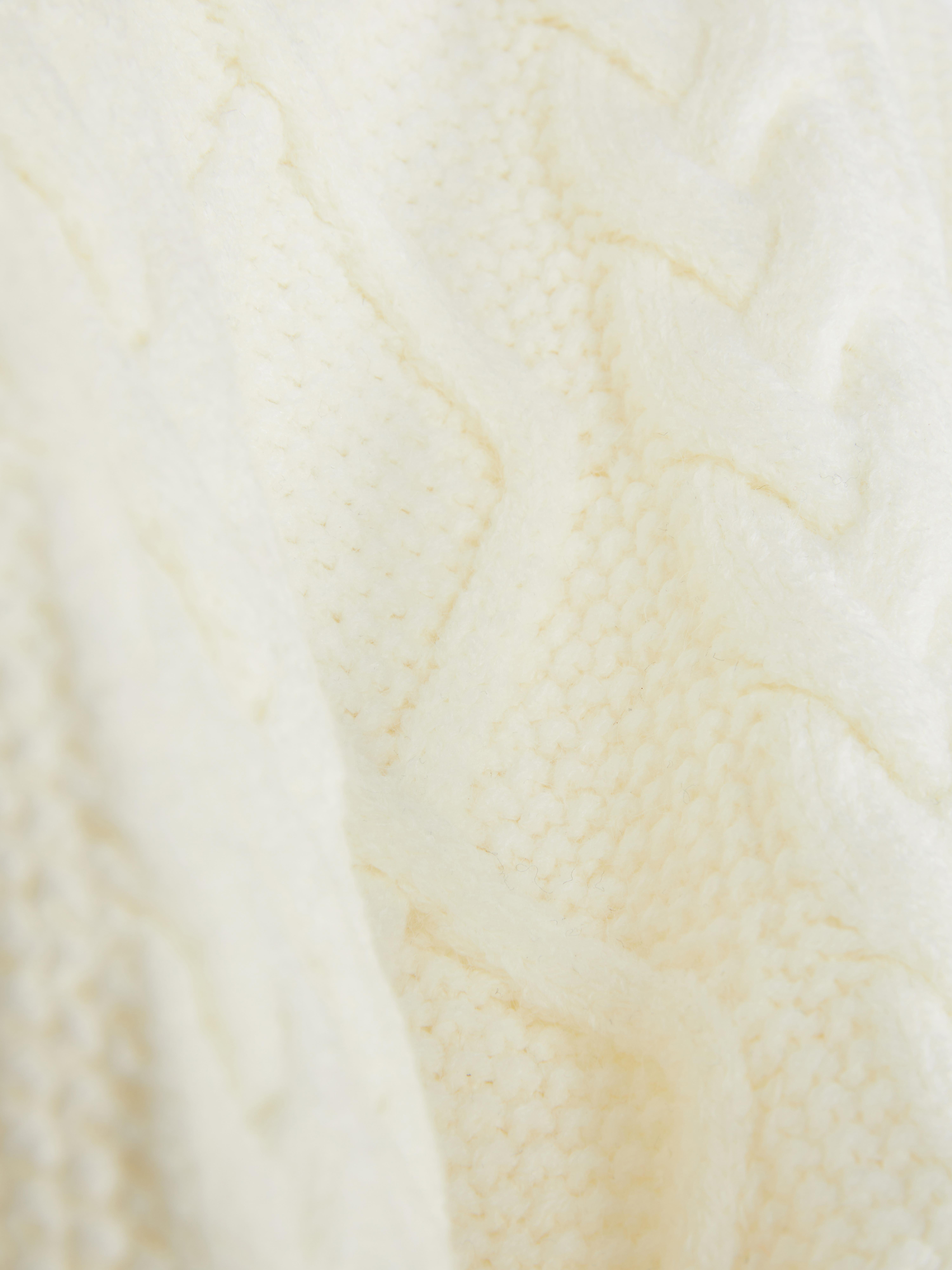 Cable knit sweater Go for a cozy look in this crew neck cable knit sweater