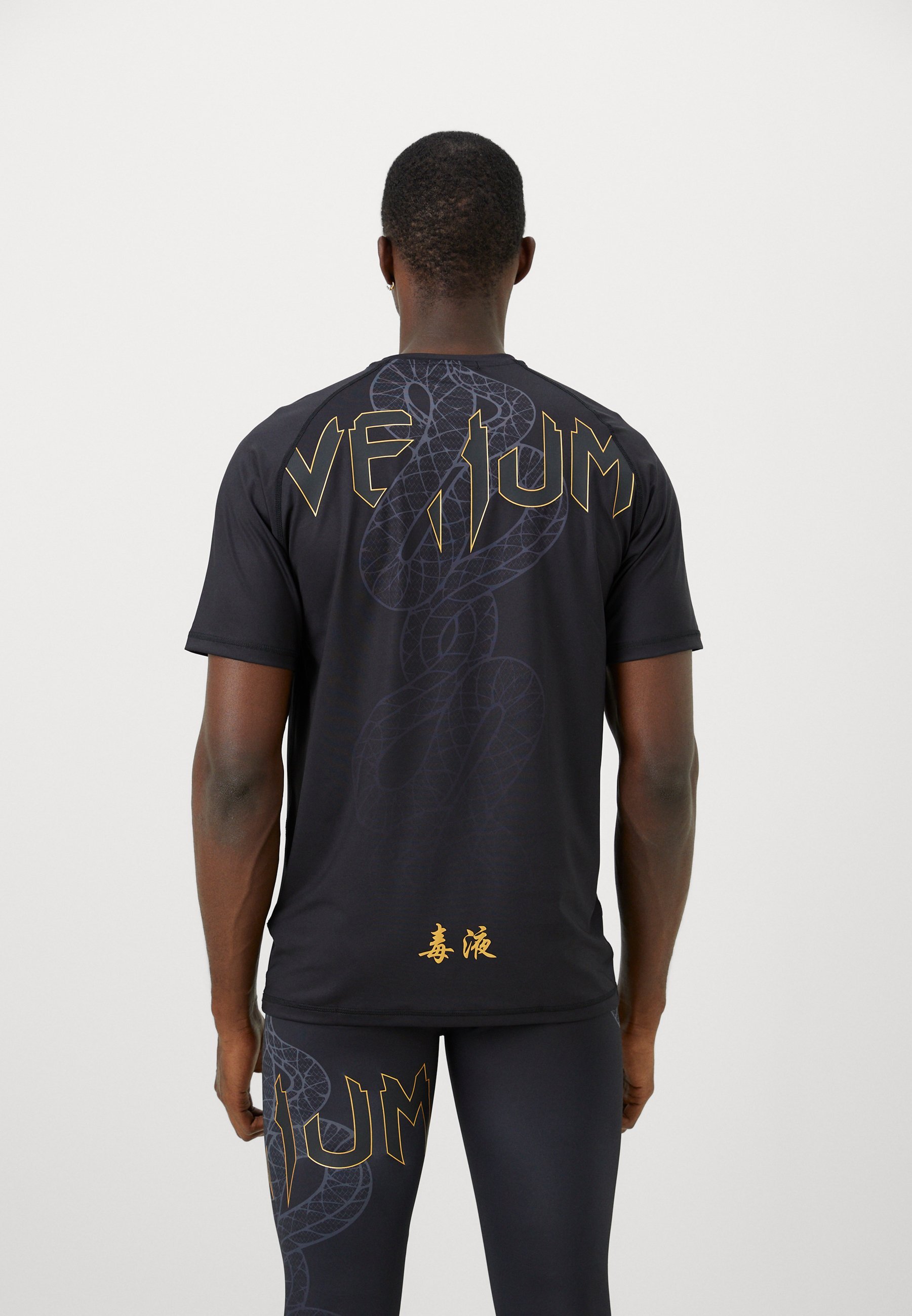 Venum SERPENTI DRY TECH - Sport T-shirt - zwart/zilver/goudkleurig