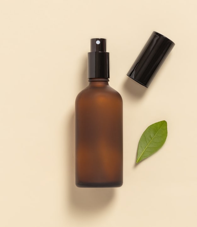 Flacon spray en verre ambré dépoli 100mL