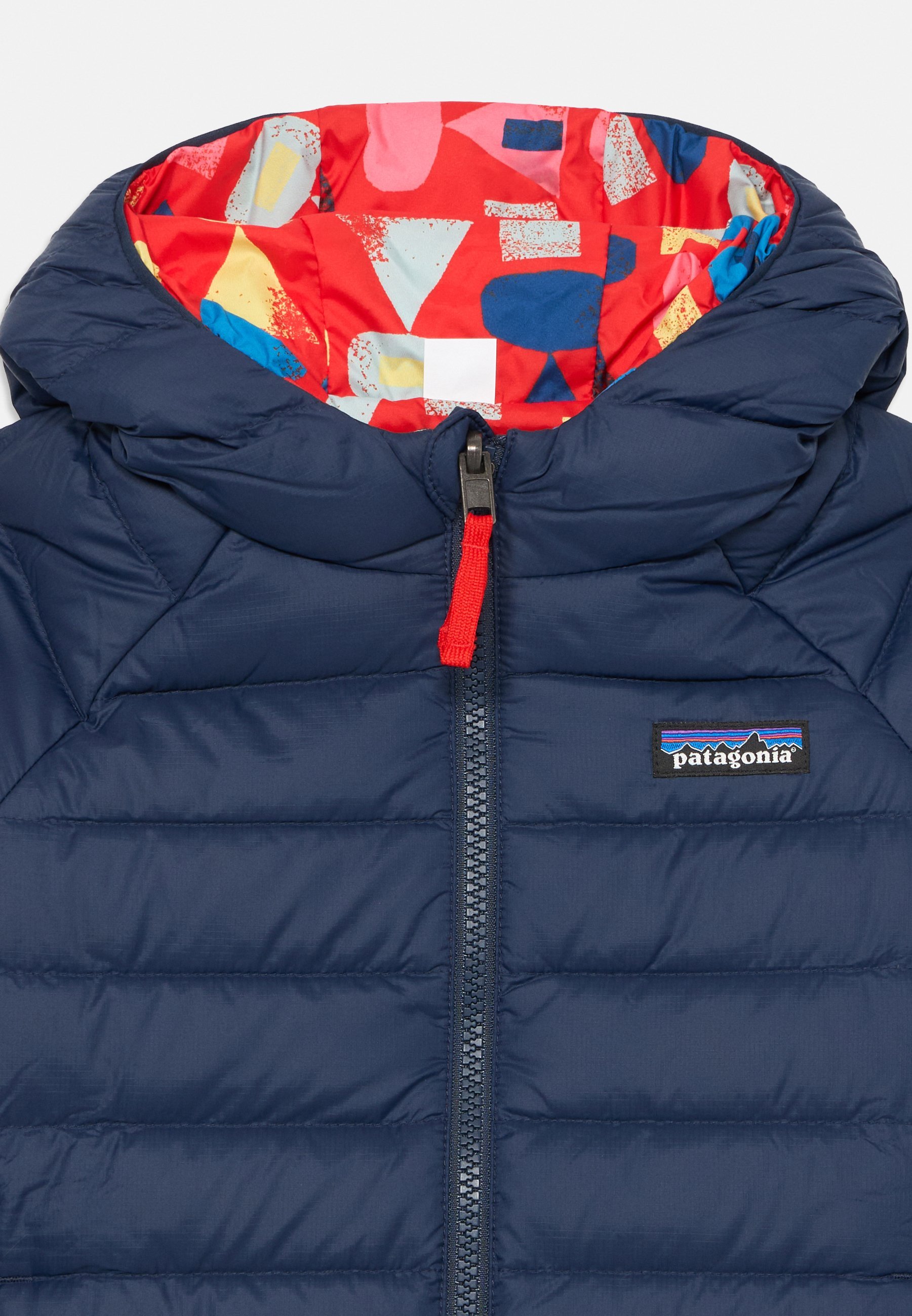 Patagonia BABY REVERSIBLE HOODY UNISEX - Donsjack - donkerblauw/rood