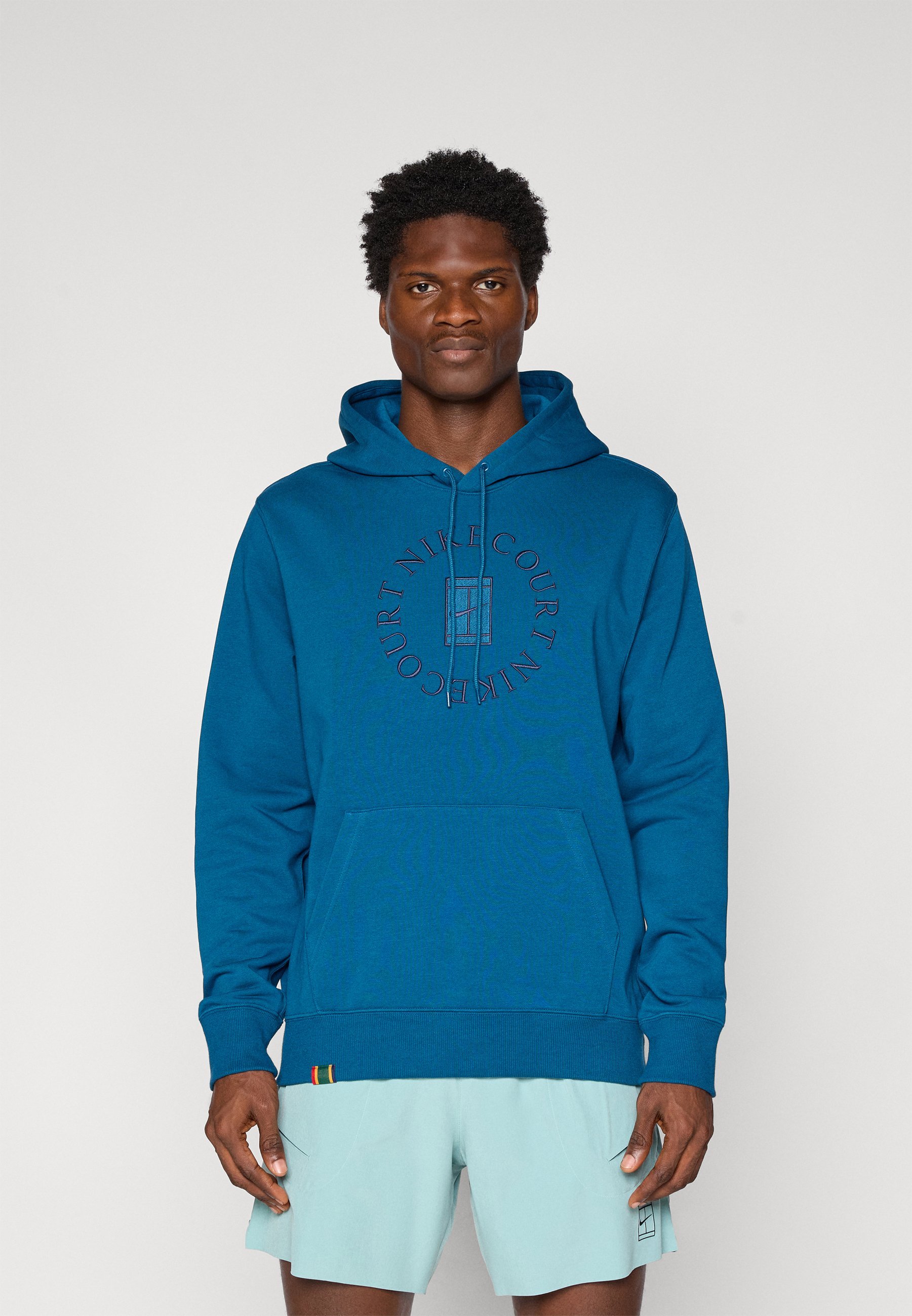 Nike Performance NIKECOURT HERITAGE HOODIE - Hoodie - Blue Force/Obsidian
