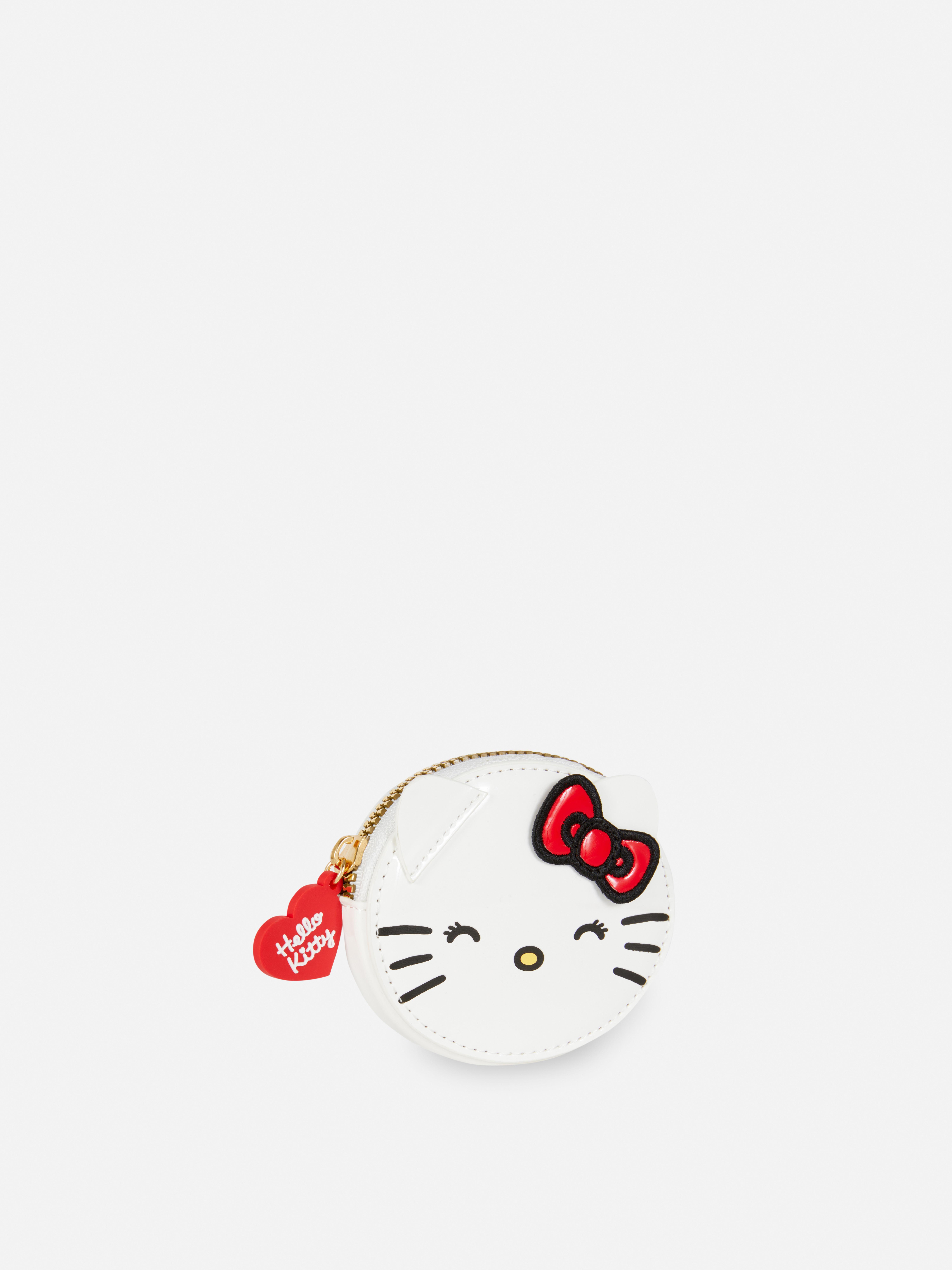 Portofel Hello Kitty Un portofel mic cu pisicuța albă, cu fermoar și un pandantiv în formă de inimă
