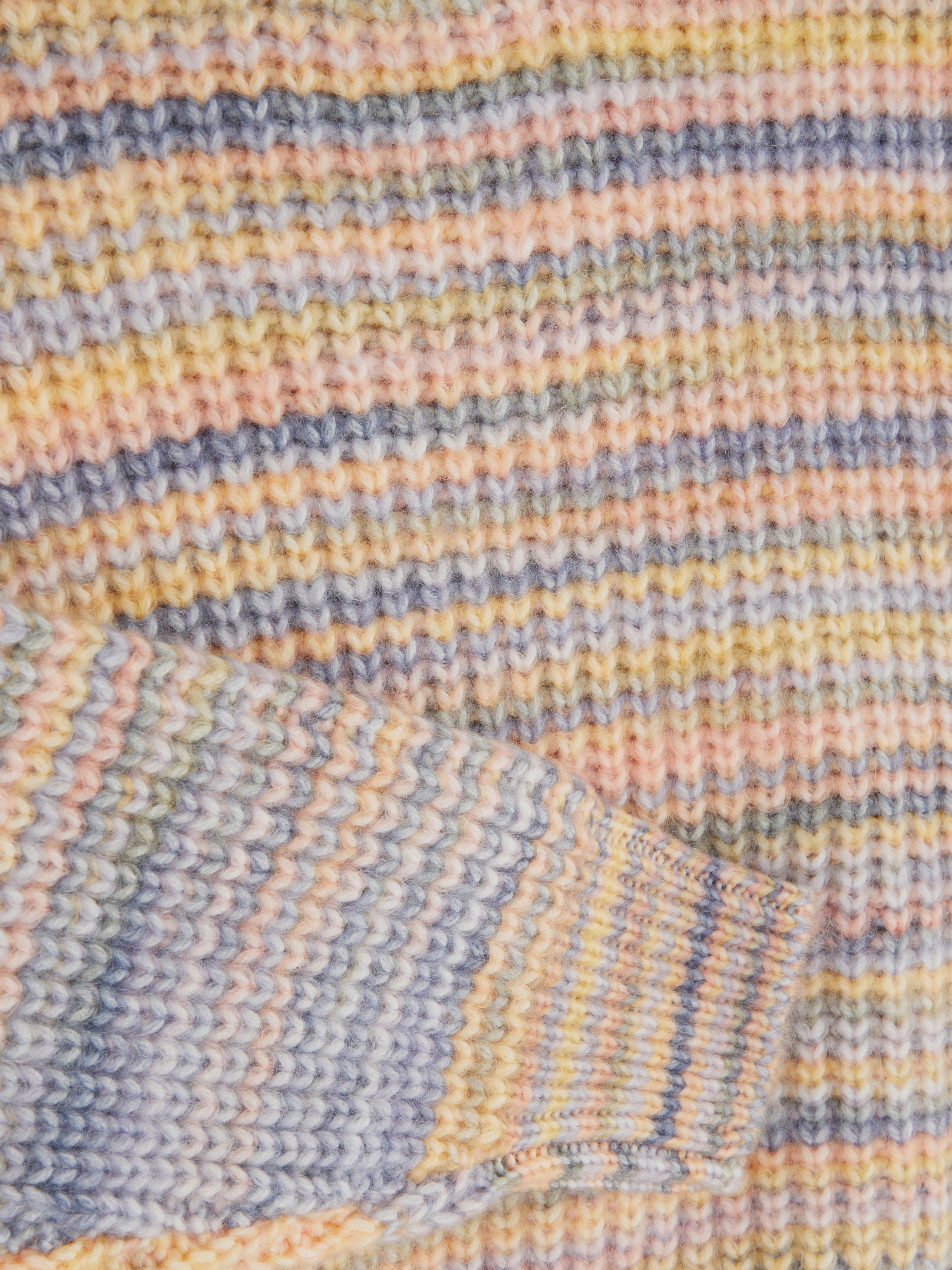 Knitted pullover A knitted sweater with balloon sleeves and ribbed cuffs