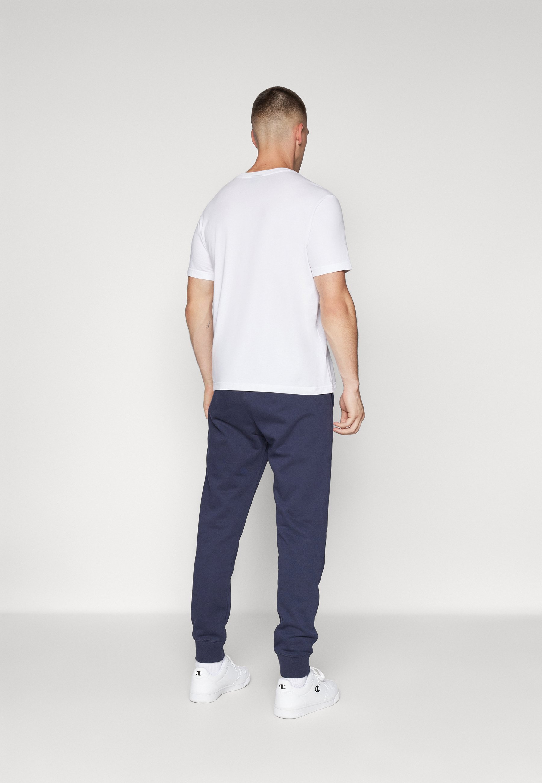 Pantalon de survêtement Champion ICONS CUFF - bleu foncé