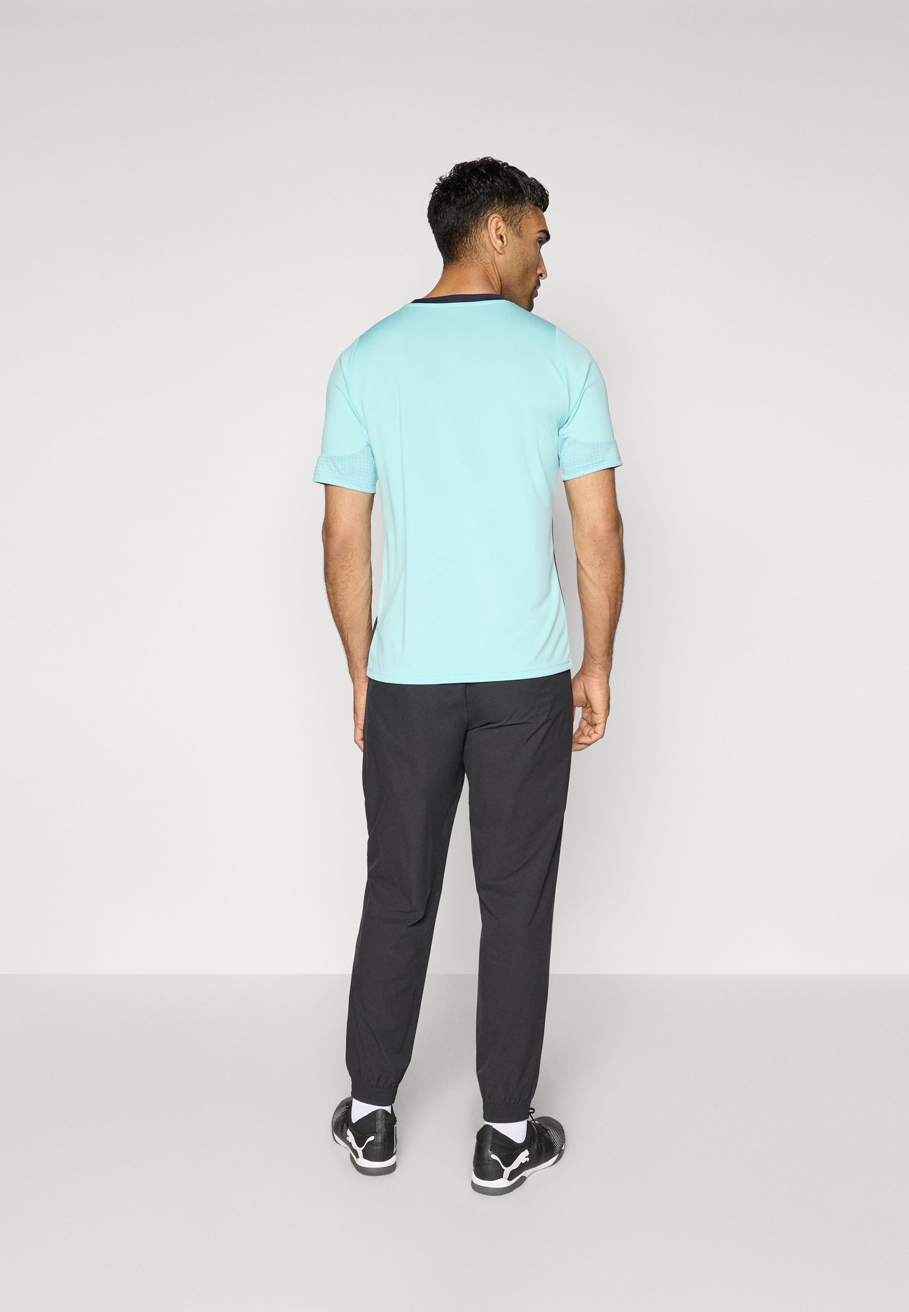 Puma OM broek - Clubkleding - zwart/zilverkleurig