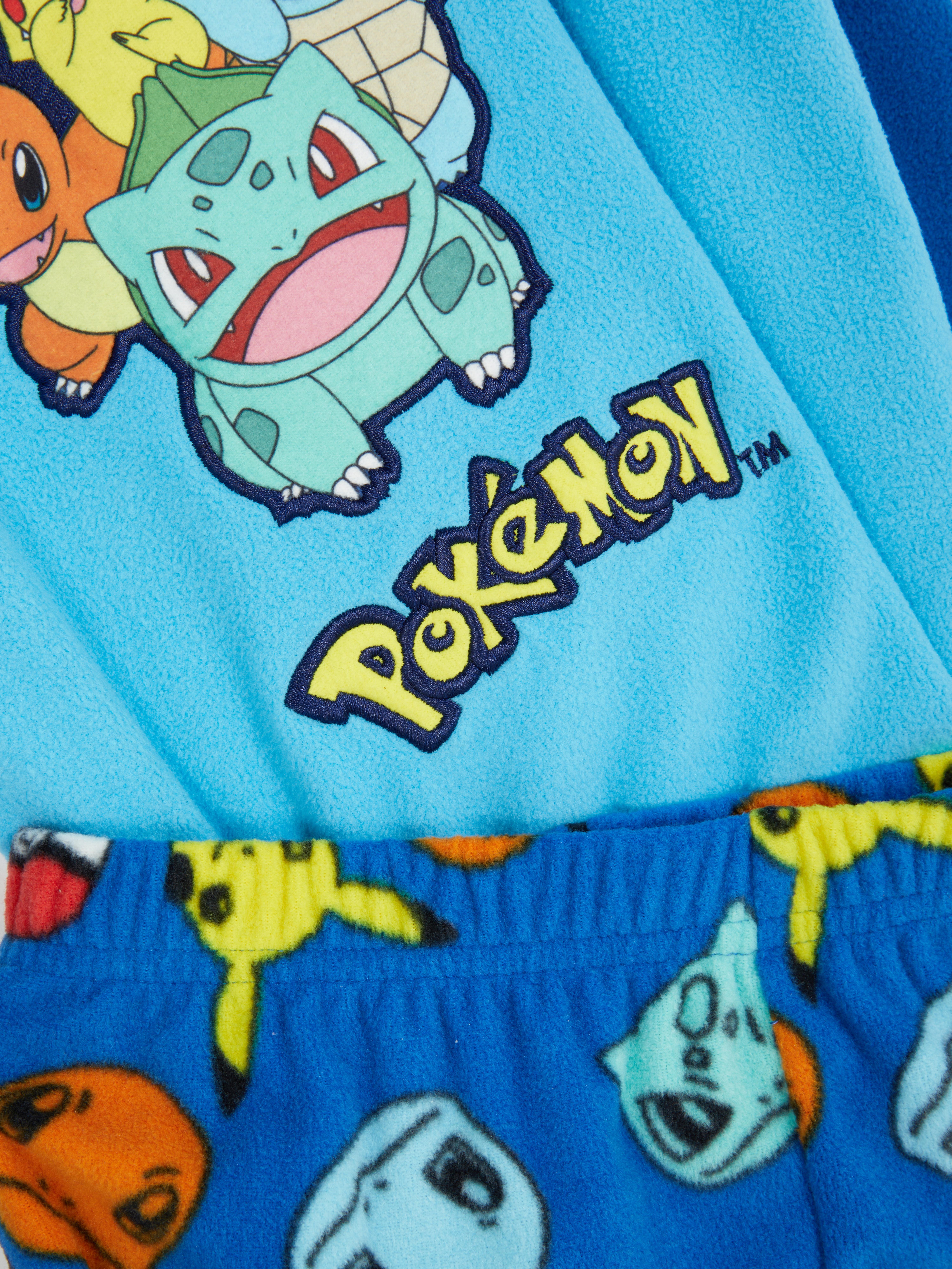 Pijamale din fleece Pokémon Kanto Starter O pijama Pokémon cu un top cu mânecă lungă și pantaloni asortați