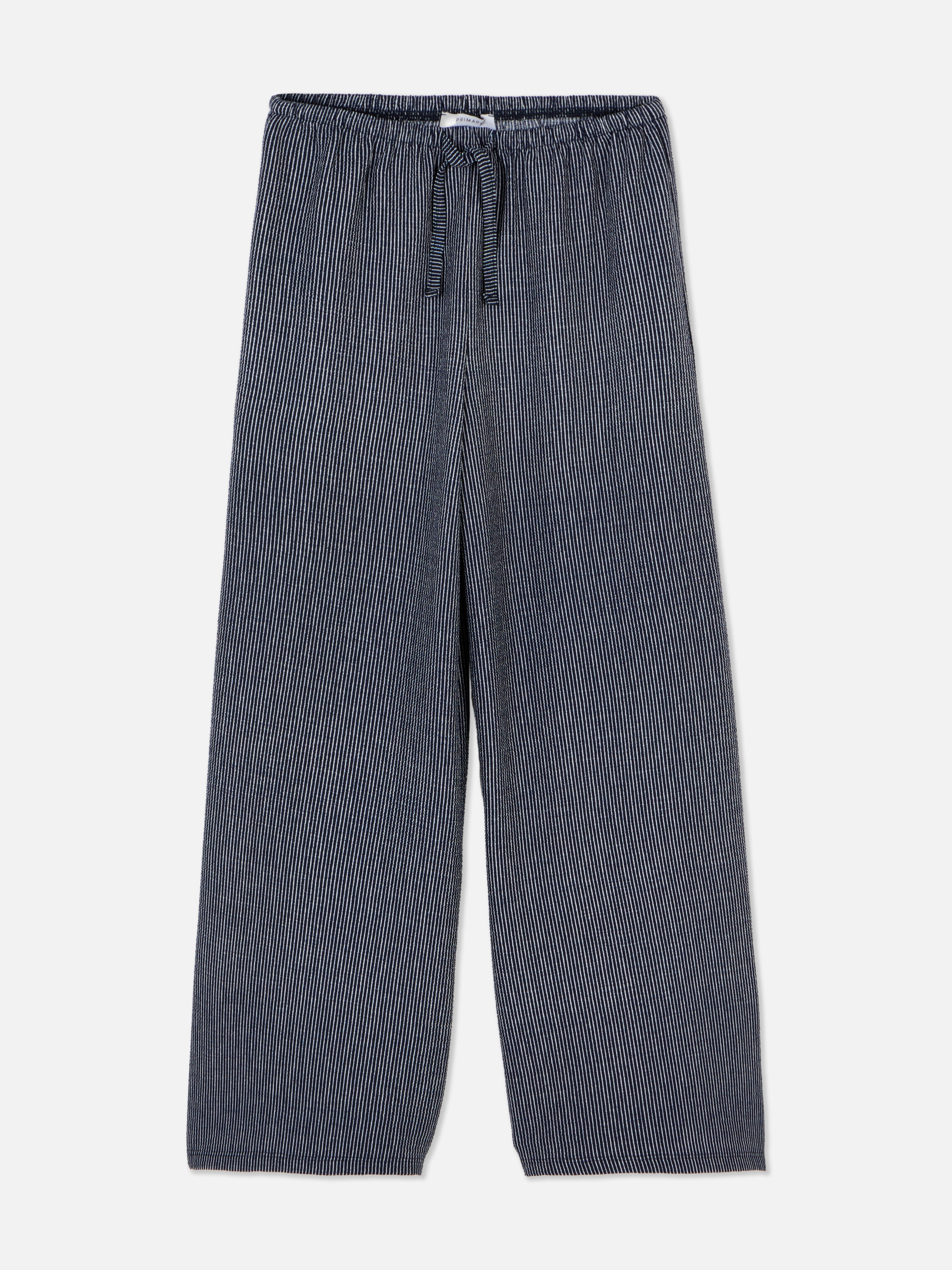 Gestreepte jersey broek Deze broek heeft relaxte wijde pijpen en een tailleband met trekkoord