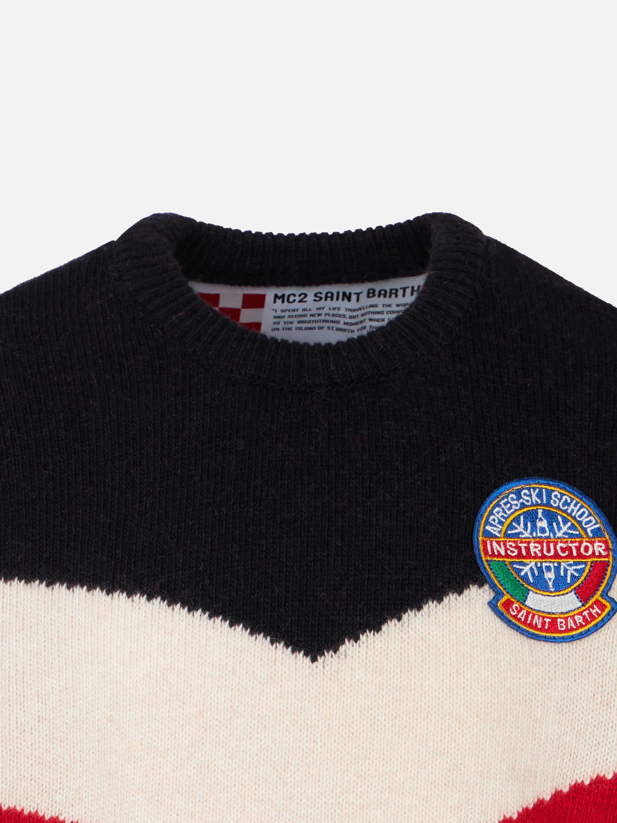 Pull enfant rouge et bleu avec écussons
