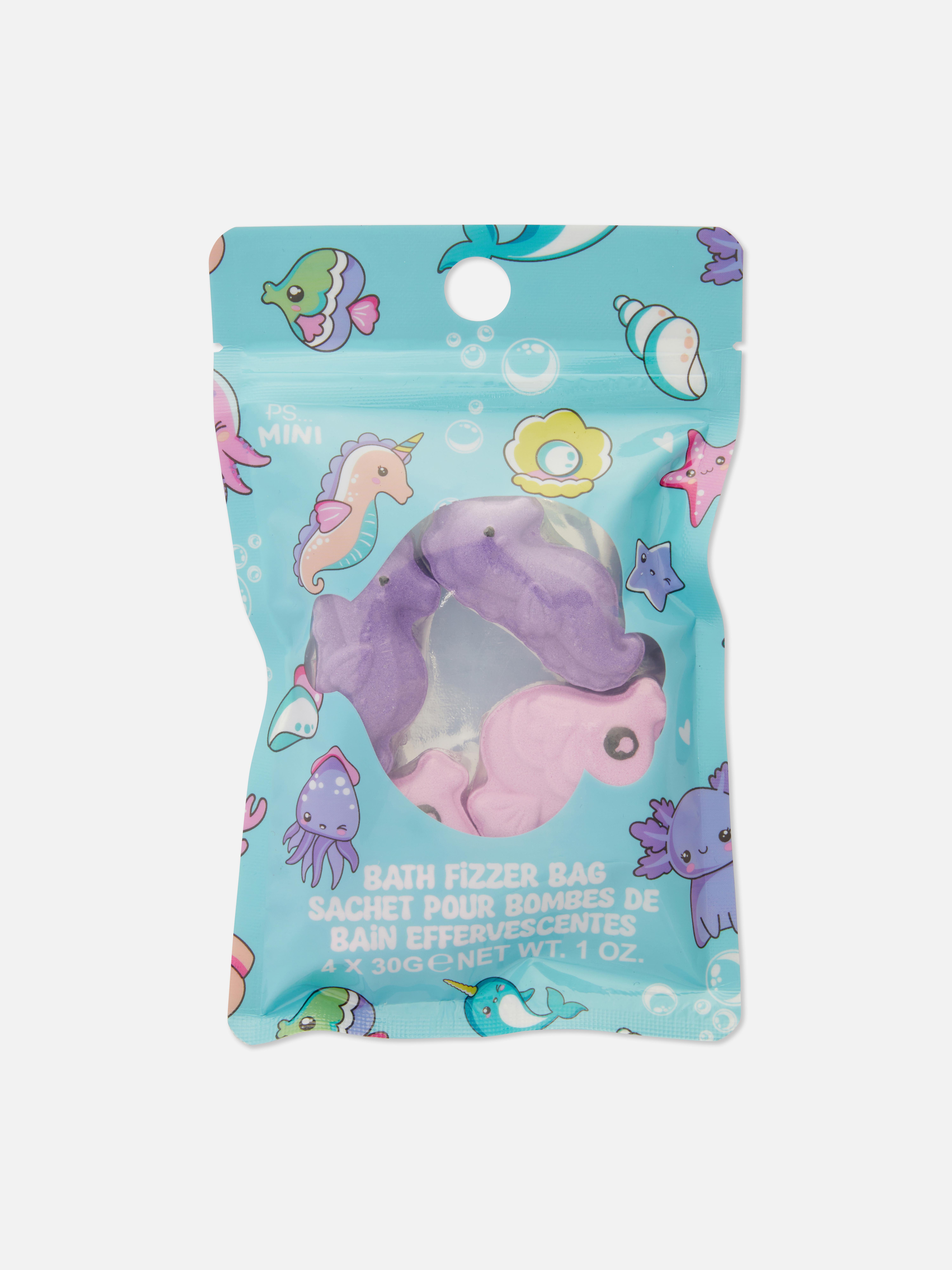 Tasje met bruisballen in de vorm van zeedieren Een tasje met bruisballen, met paarse zeepaardjes en andere zeedieren