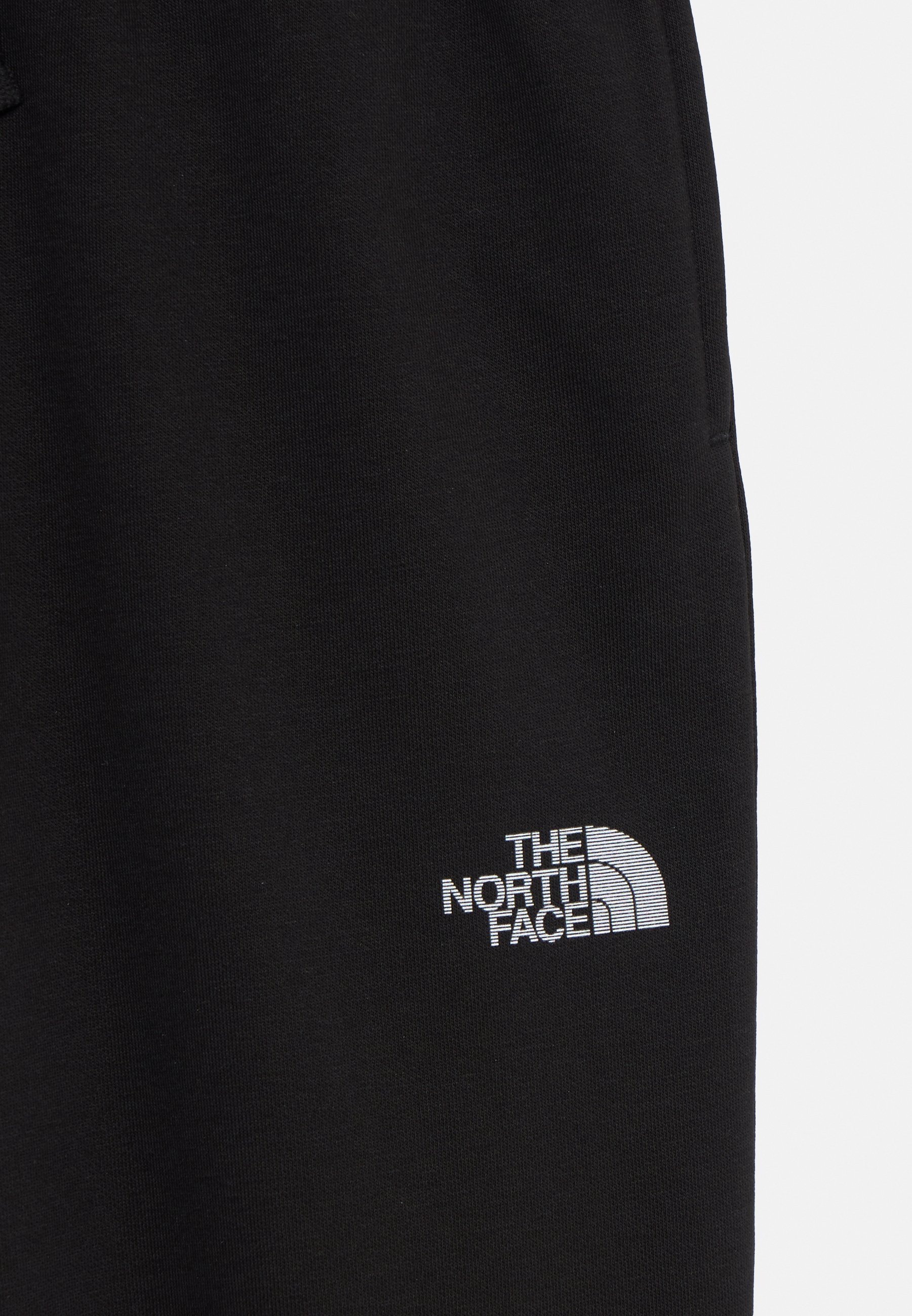 Pantalon de survêtement unisexe The North Face à logo réfléchissant - noir