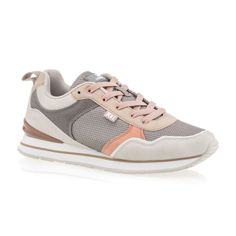 Zapatillas deportivas para mujer color beige.