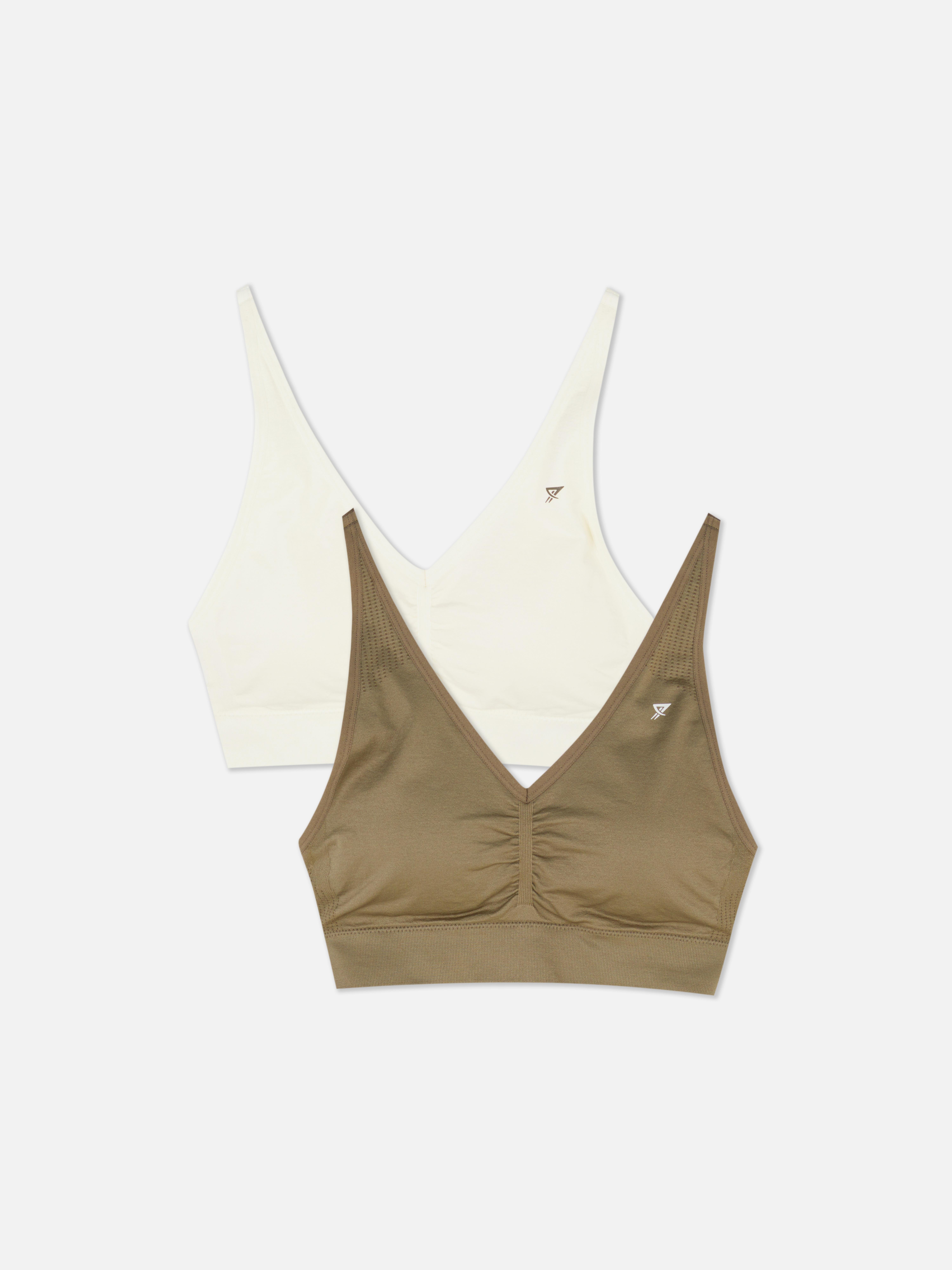 Seamless sports bras, set of 2. Two unpadded sports bras with adjustable straps.