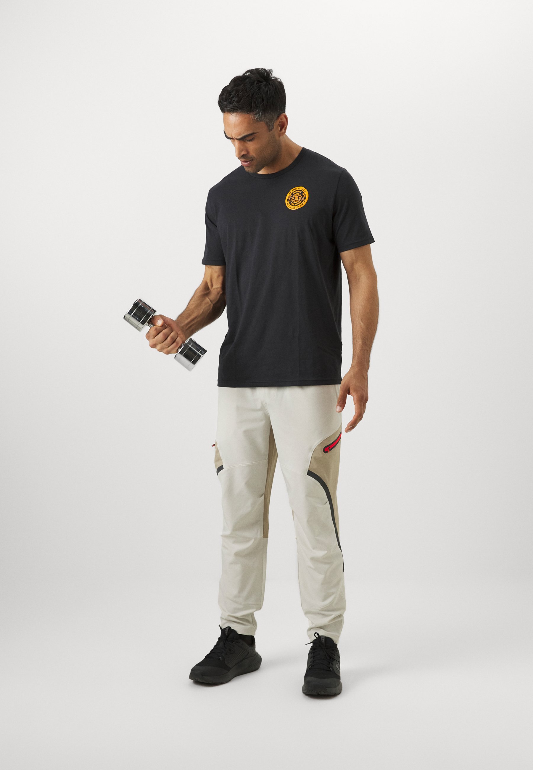 Under Armour UNSTOPPABLE - Spodnie dresowe - Summit White/City Khaki/Black