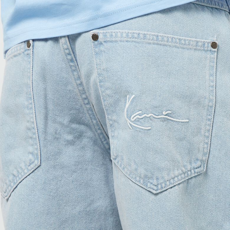 Small Signature Tapered Five Pocket Denim