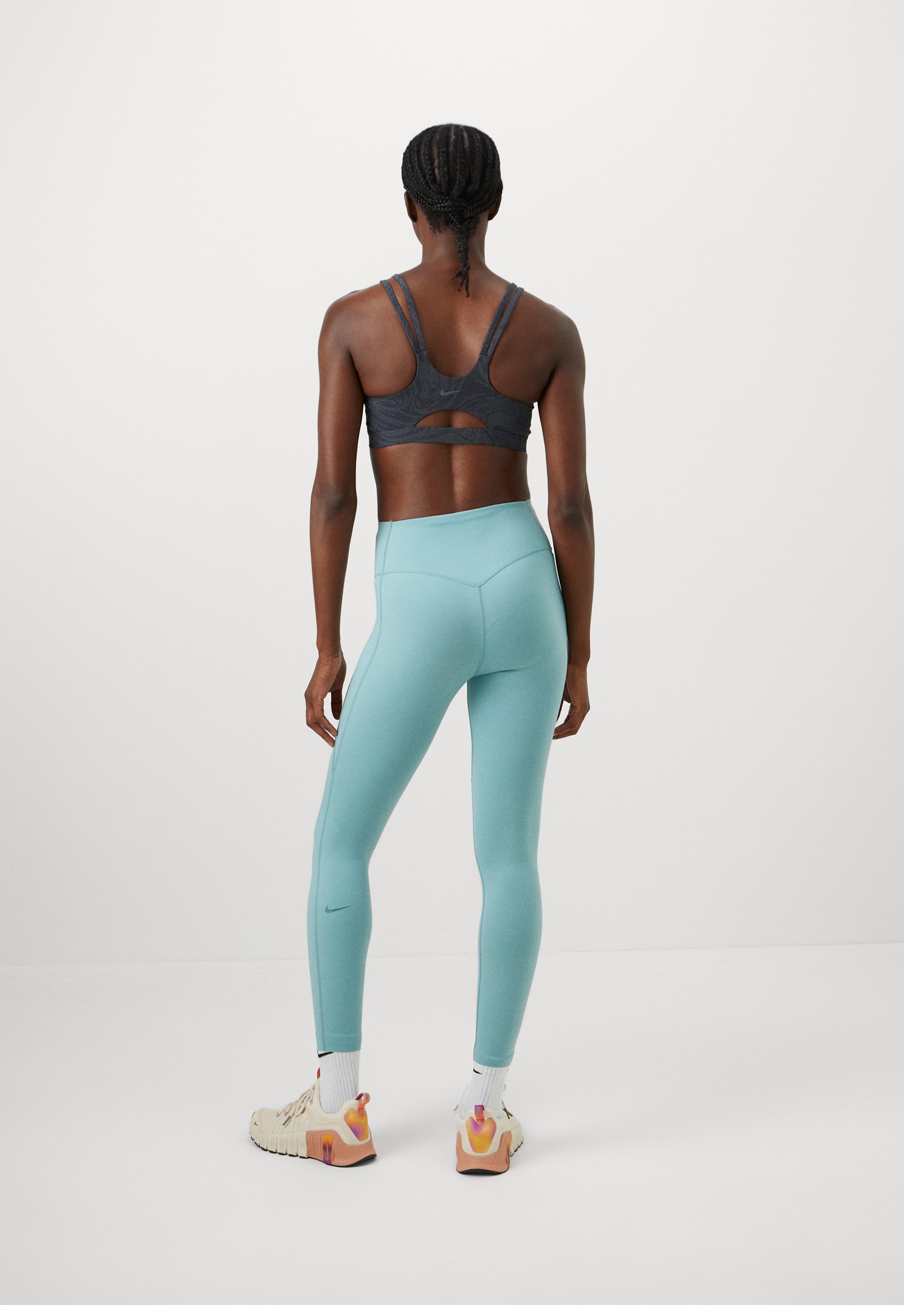 Nike Performance UNIVERSA SEAMLESS FRONT 7/8 - Legíny - cannon/bicoastal
