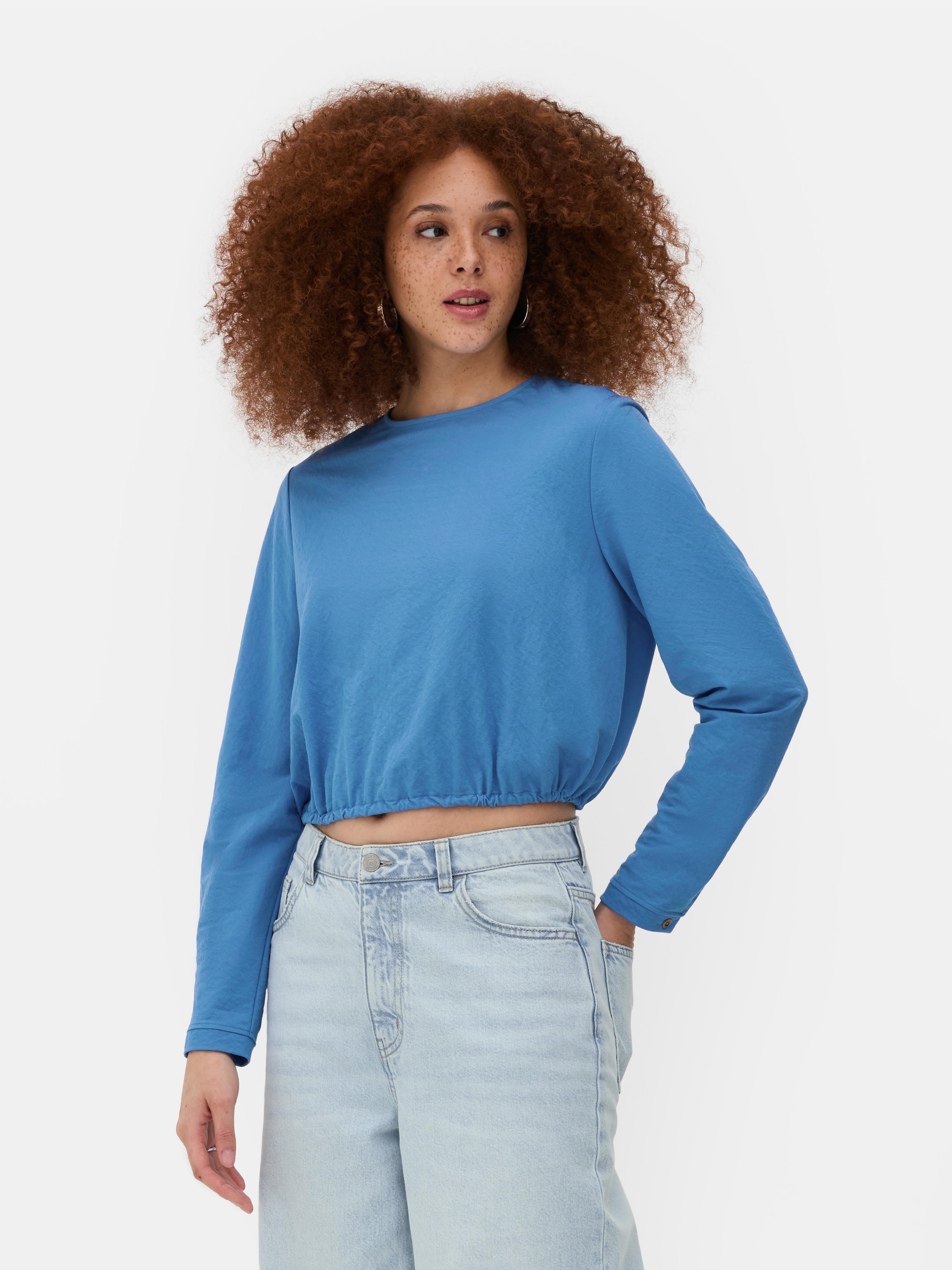 Blouse met elastische zoom Deze top heeft lange mouwen en een verstelbare zoom
