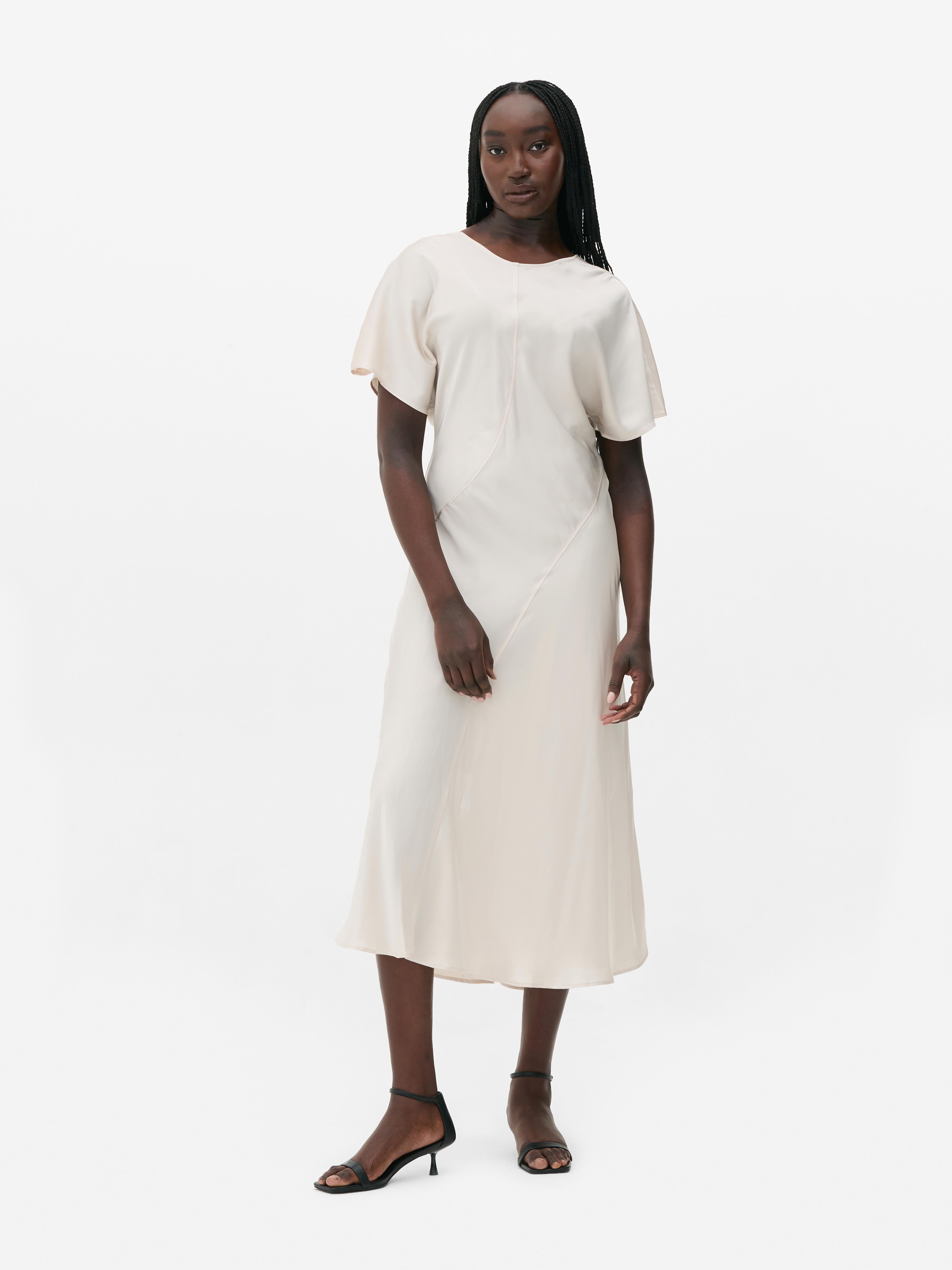 Rochie midi The Edit O rochie elegantă cu mâneci scurte și o croială oblică flatantă