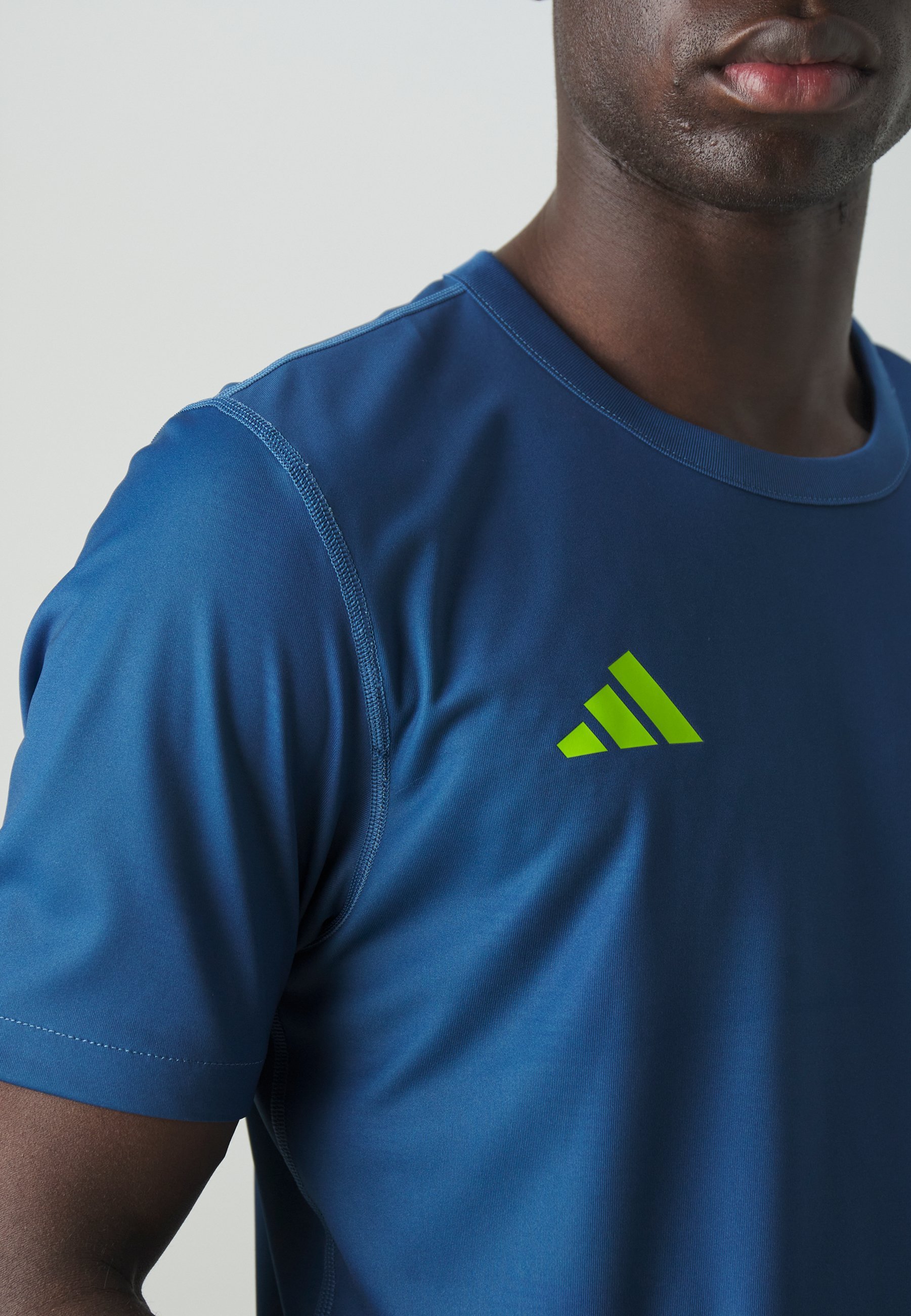 adidas Performance REV 24 JERSEY - Športna majica - temno modra/polzelena