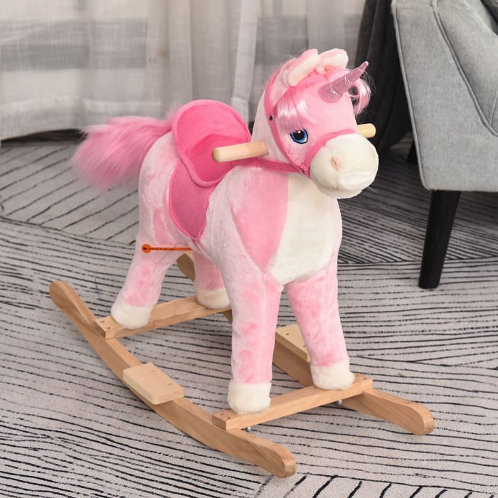 Cheval à Bascule HOMCOM modèle Licorne avec Sons Authentiques Selle Grand Confort Bois de peuplier Rose dim. L74 x l33 x 62H cm