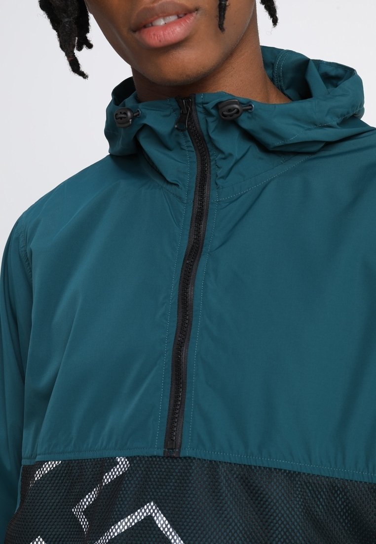 Coupe-vent HUF - bleu