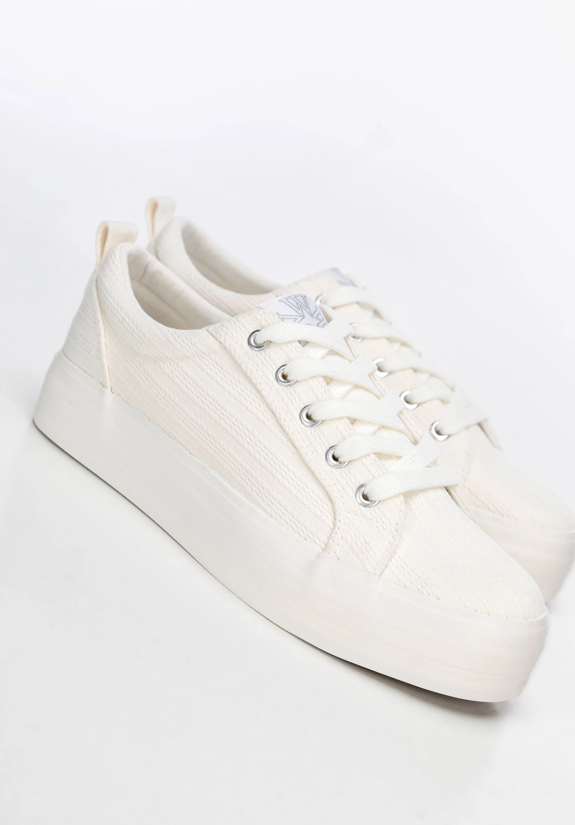 Damskie sneakersy na platformie kremowe