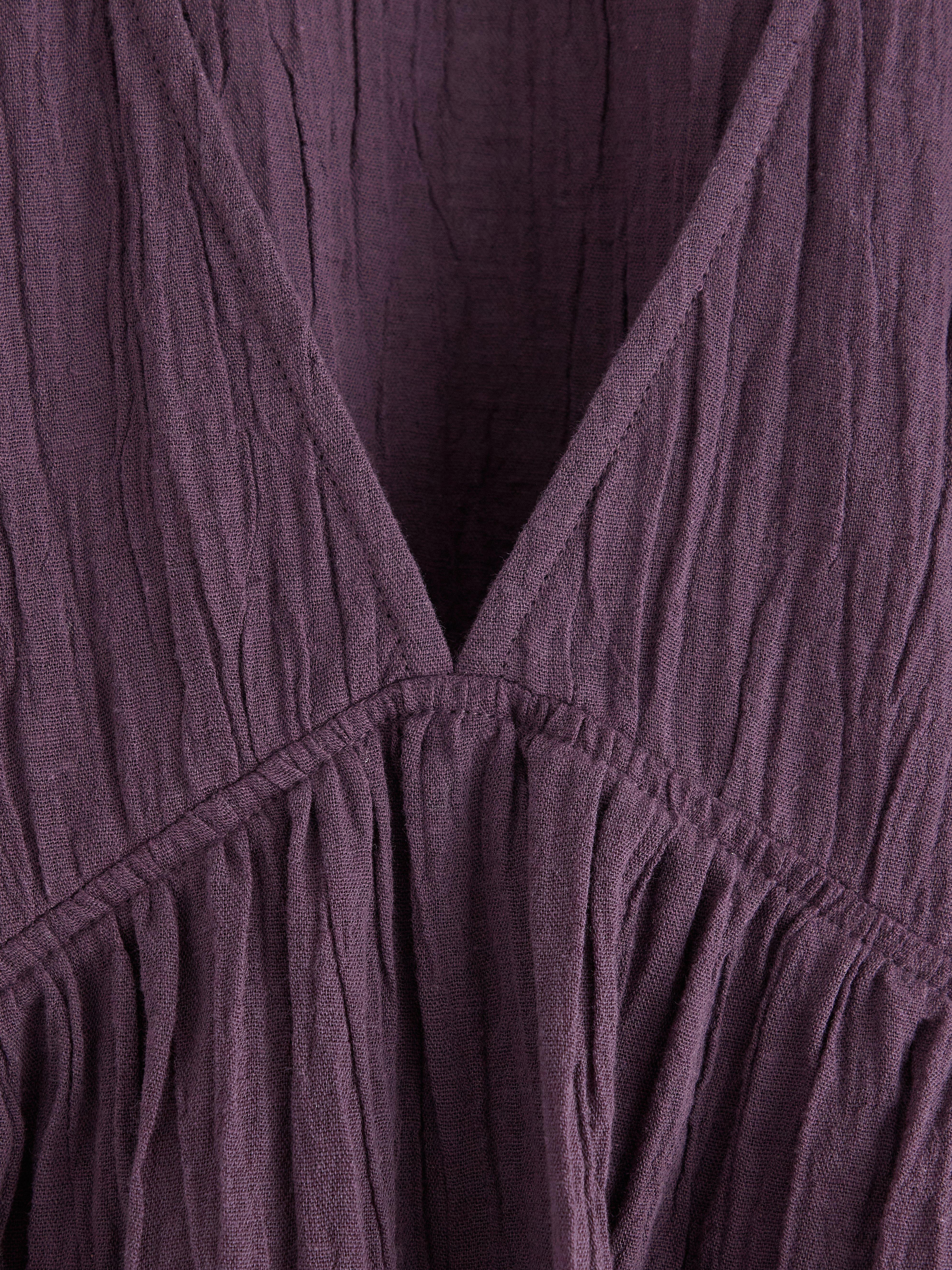 Blusa de manga corta color lila oscuro empolvado