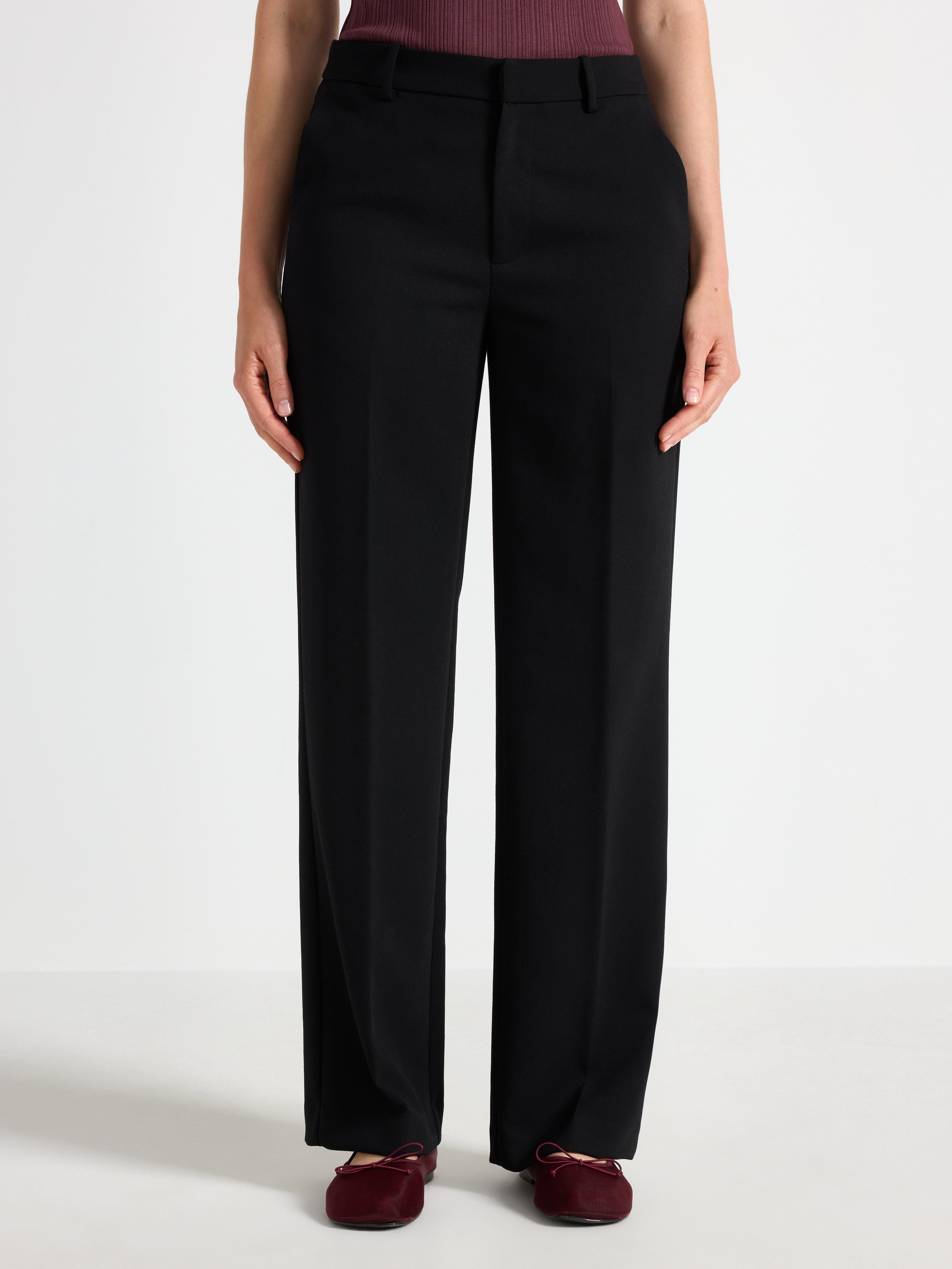 Calça reta NOOR com cintura normal, preta.