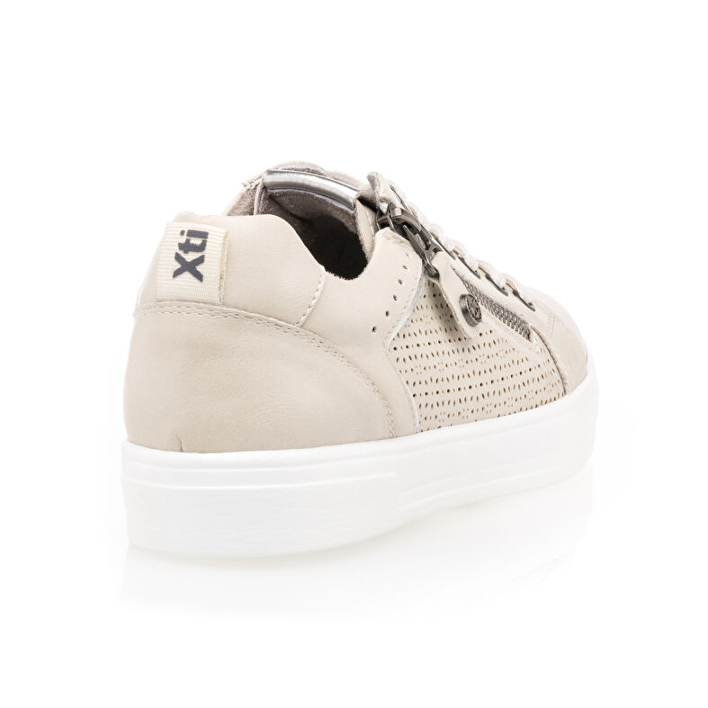 Zapatillas deportivas para mujer color beige.