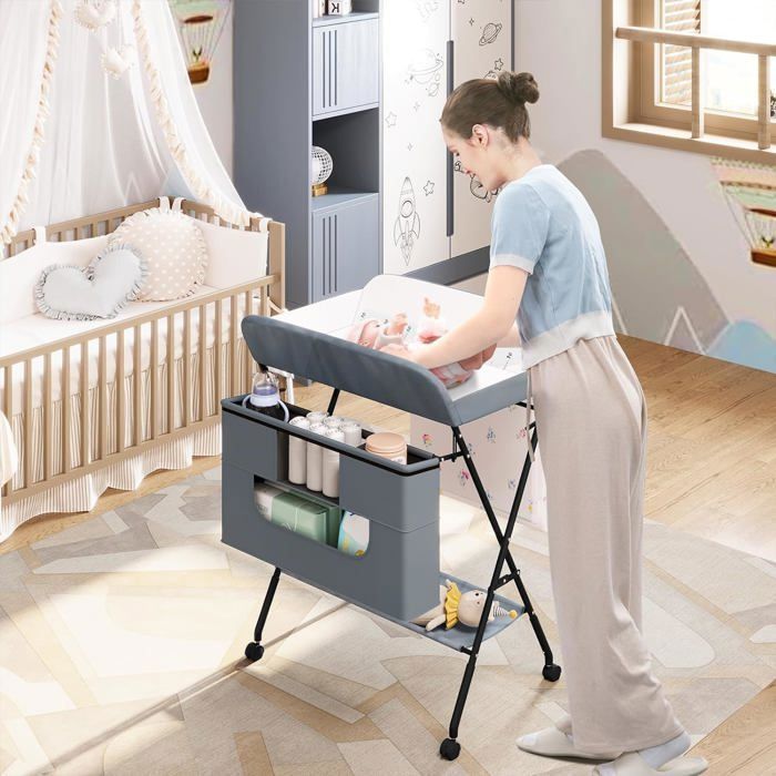 Cambiador plegable y portátil WOLTU con ruedas y cesta, altura regulable, estructura metálica, tela Oxford, gris.