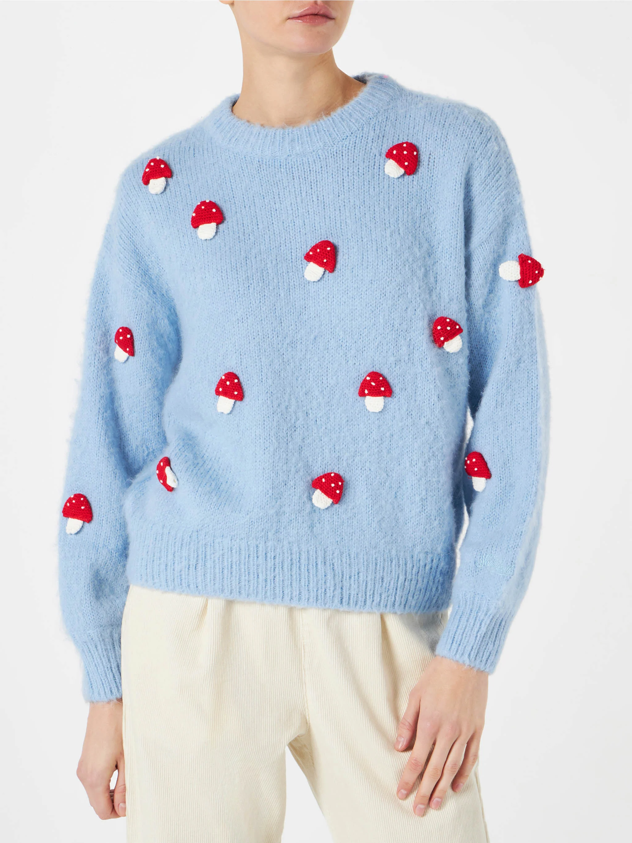 Jersey de cuello redondo cepillado para mujer con aplique de seta.