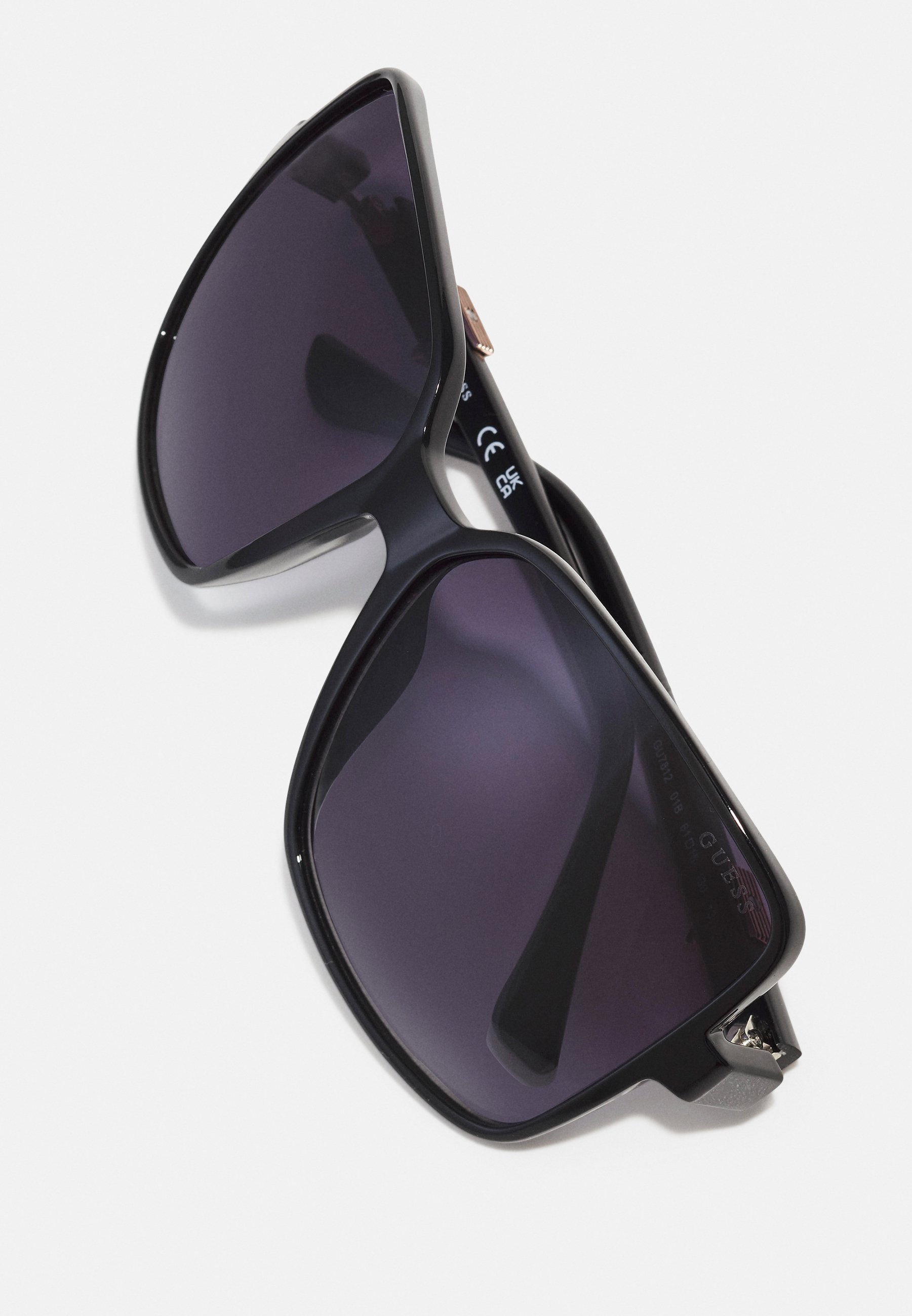 Lunettes de soleil Guess - noires
