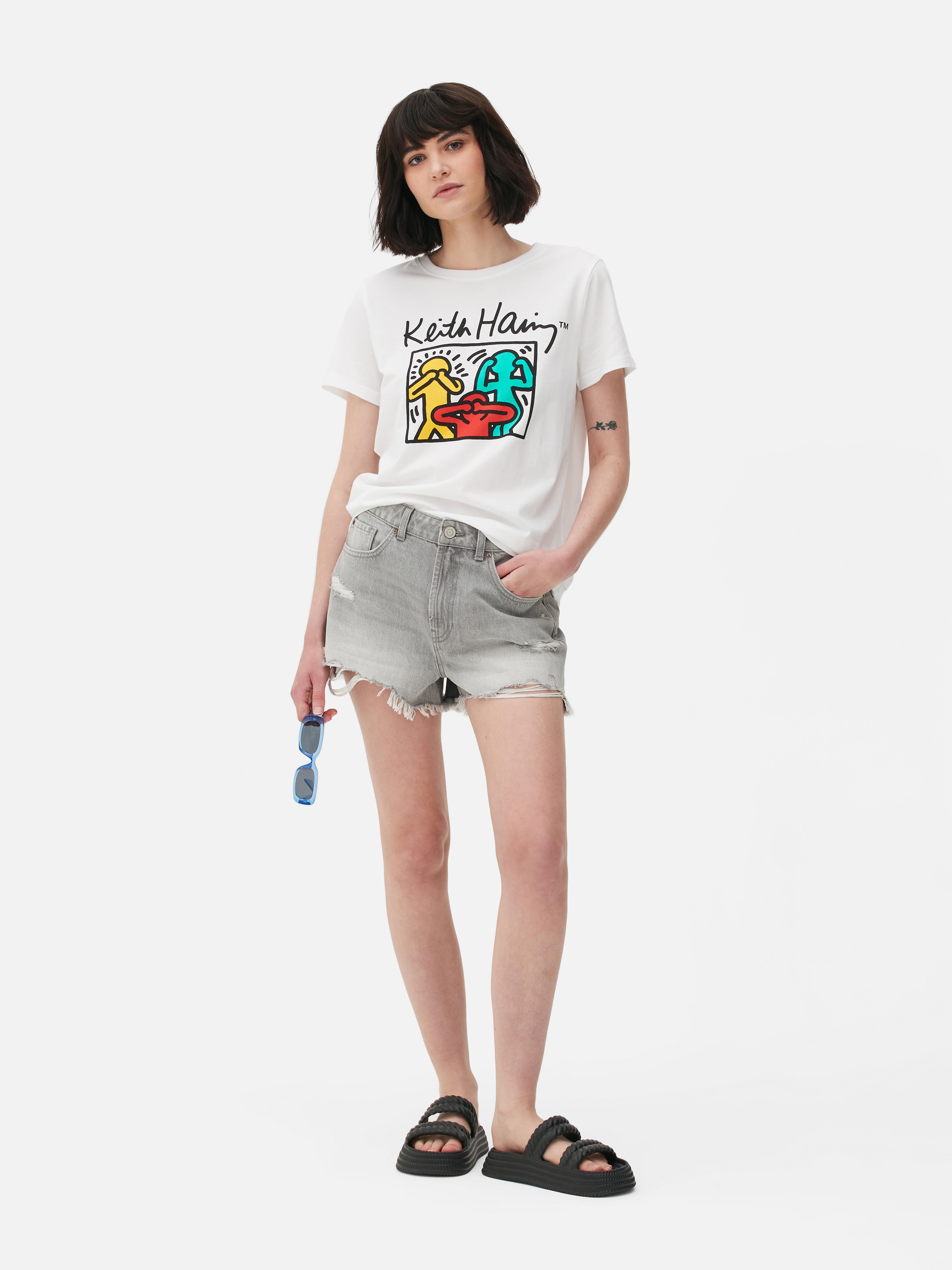 Tricou cu imprimeu Keith Haring Înveselește-ți colecția cu acest tricou cu mânecă scurtă, care prezintă culorile vibrante și figurile funky ale lui Keith Haring.