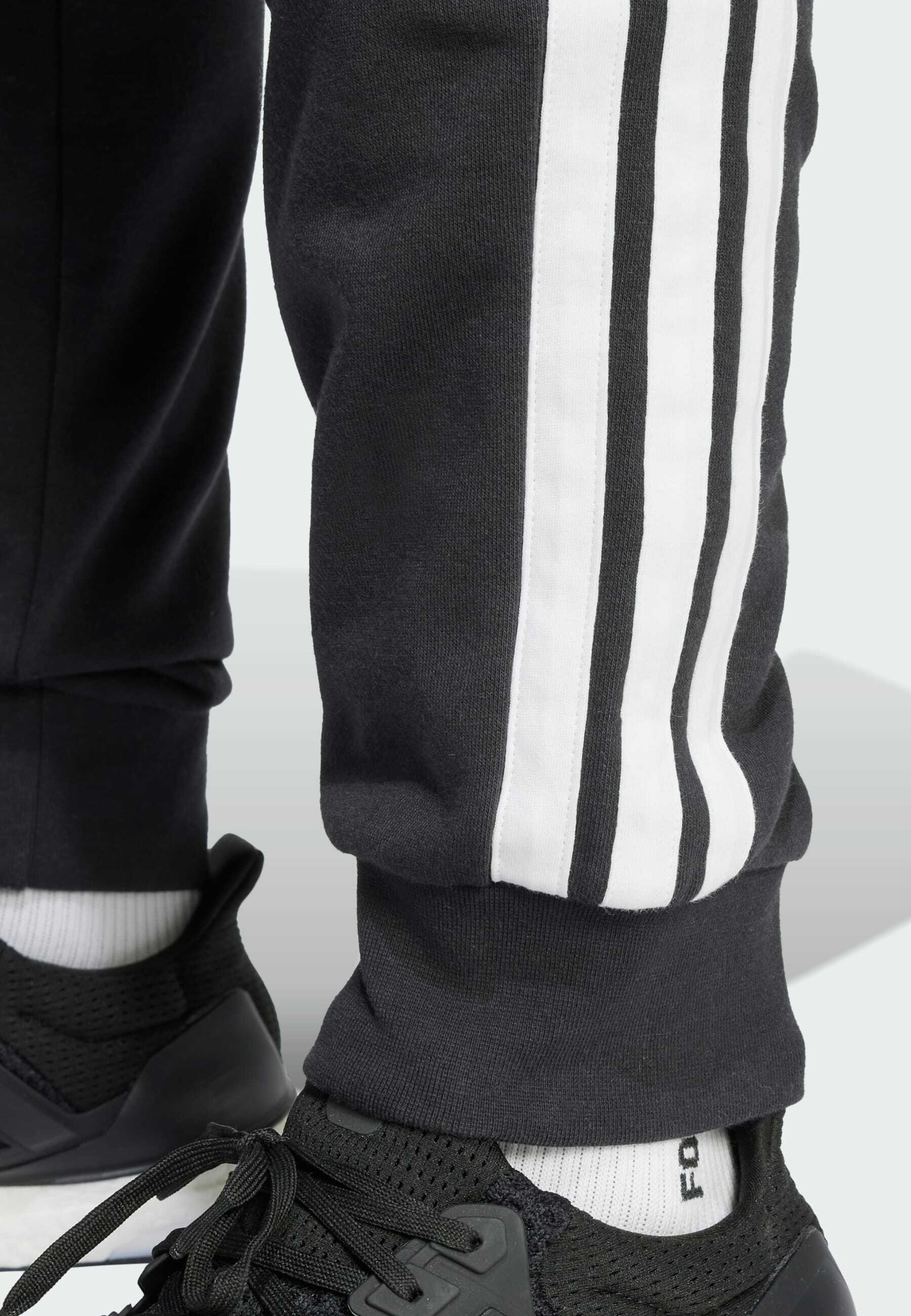adidas Sportswear ESSENTIAL 3-STRIPES - Trainingsbroek - zwart wit